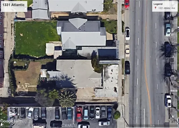 an aerial view of multiple houses with outdoor space