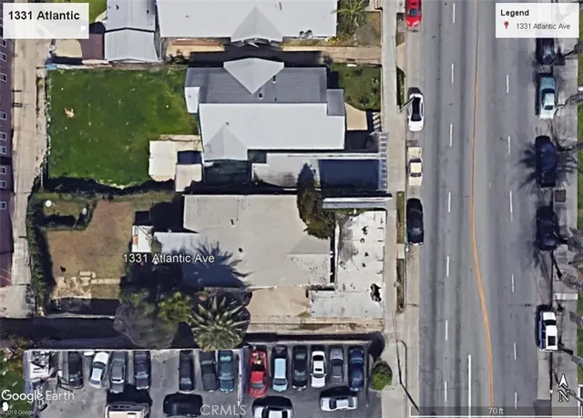 an aerial view of multiple houses with outdoor space
