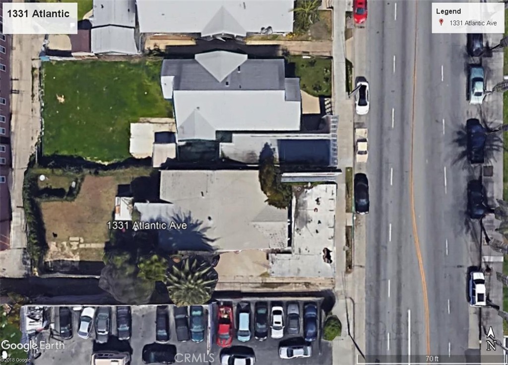 an aerial view of multiple houses with outdoor space