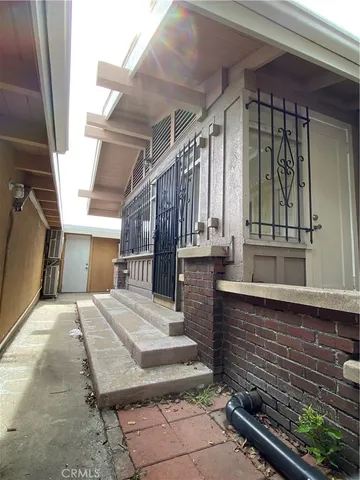 a stove top oven sitting inside of a kitchen