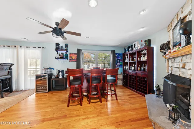 a view of a livingroom with furniture window and wooden floor