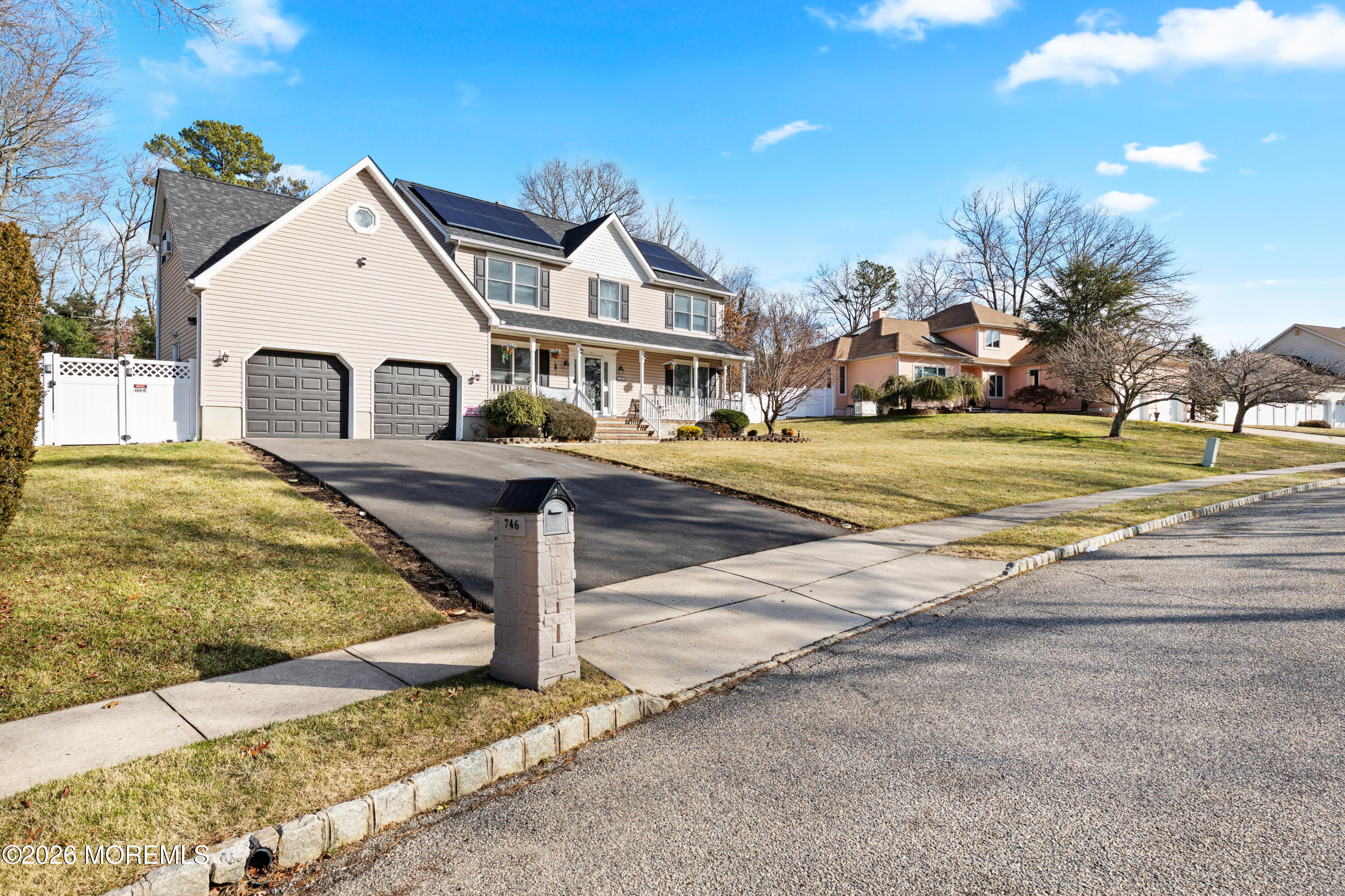 746 Rabbit Run Brick, NJ 08724 - Photo 2 of 41 a view of a white house with a yard and large tree