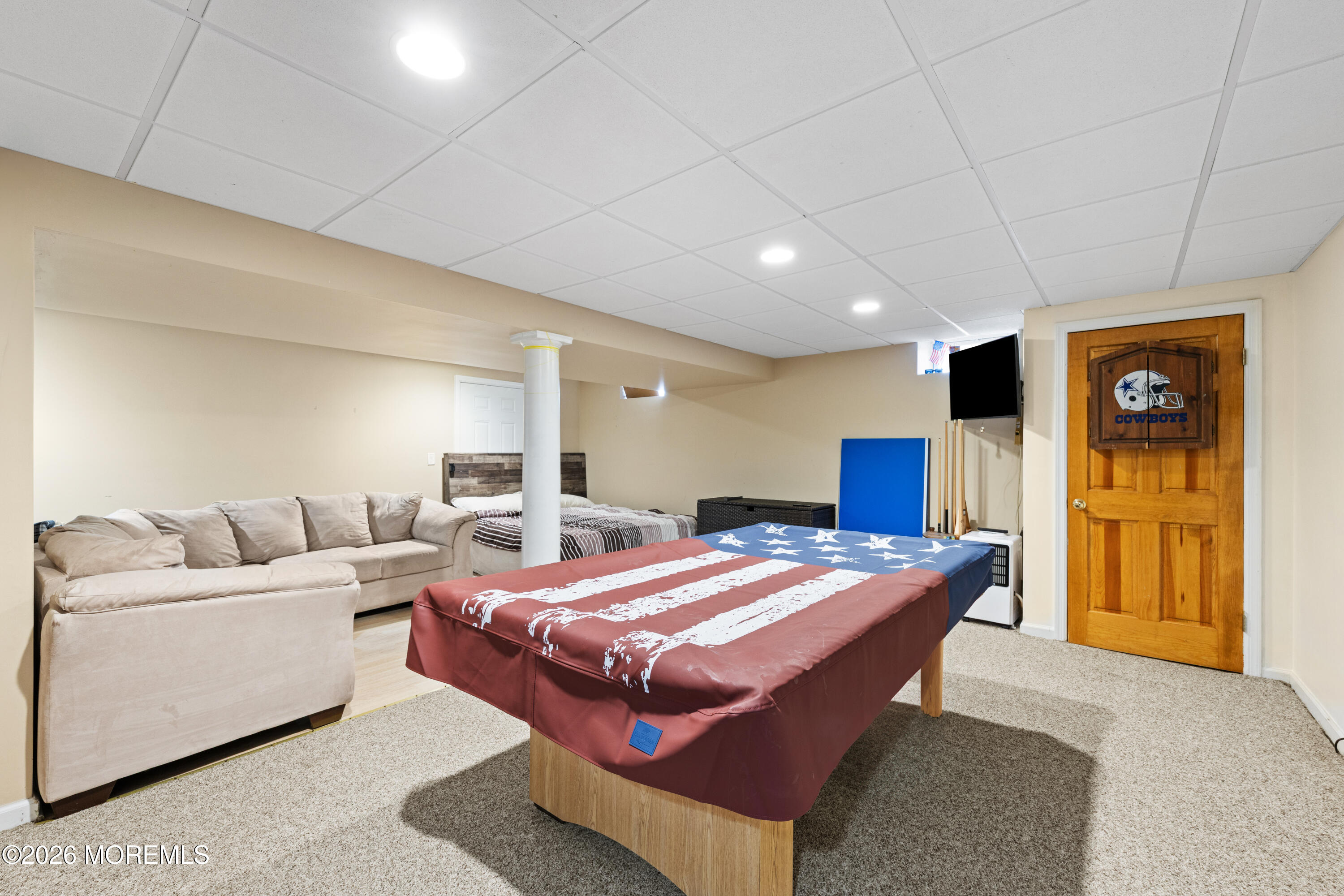 746 Rabbit Run Brick, NJ 08724 - Photo 27 of 41 a bedroom with a bed and a couch