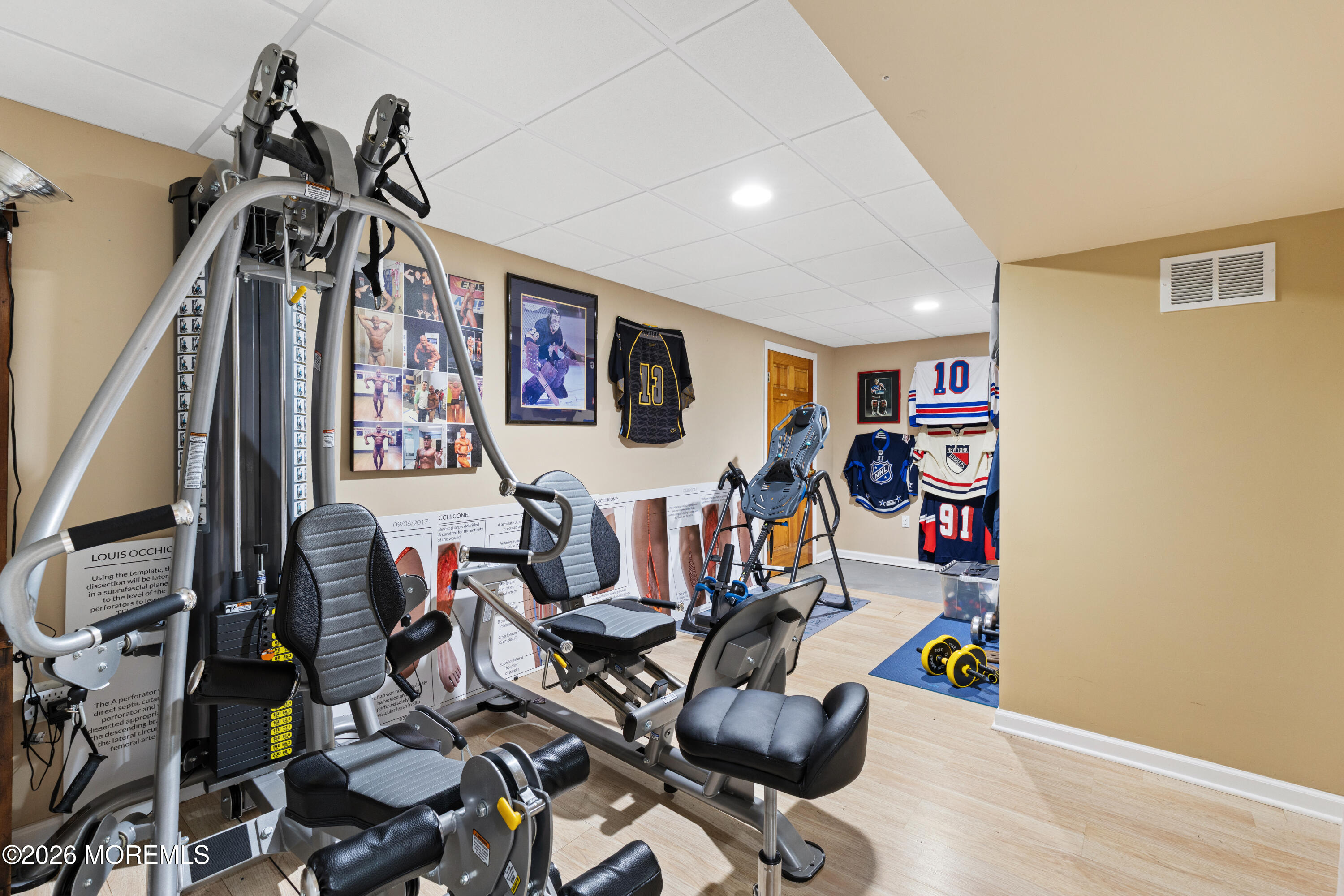 746 Rabbit Run Brick, NJ 08724 - Photo 28 of 41 a view of a livingroom with furniture and gym equipment