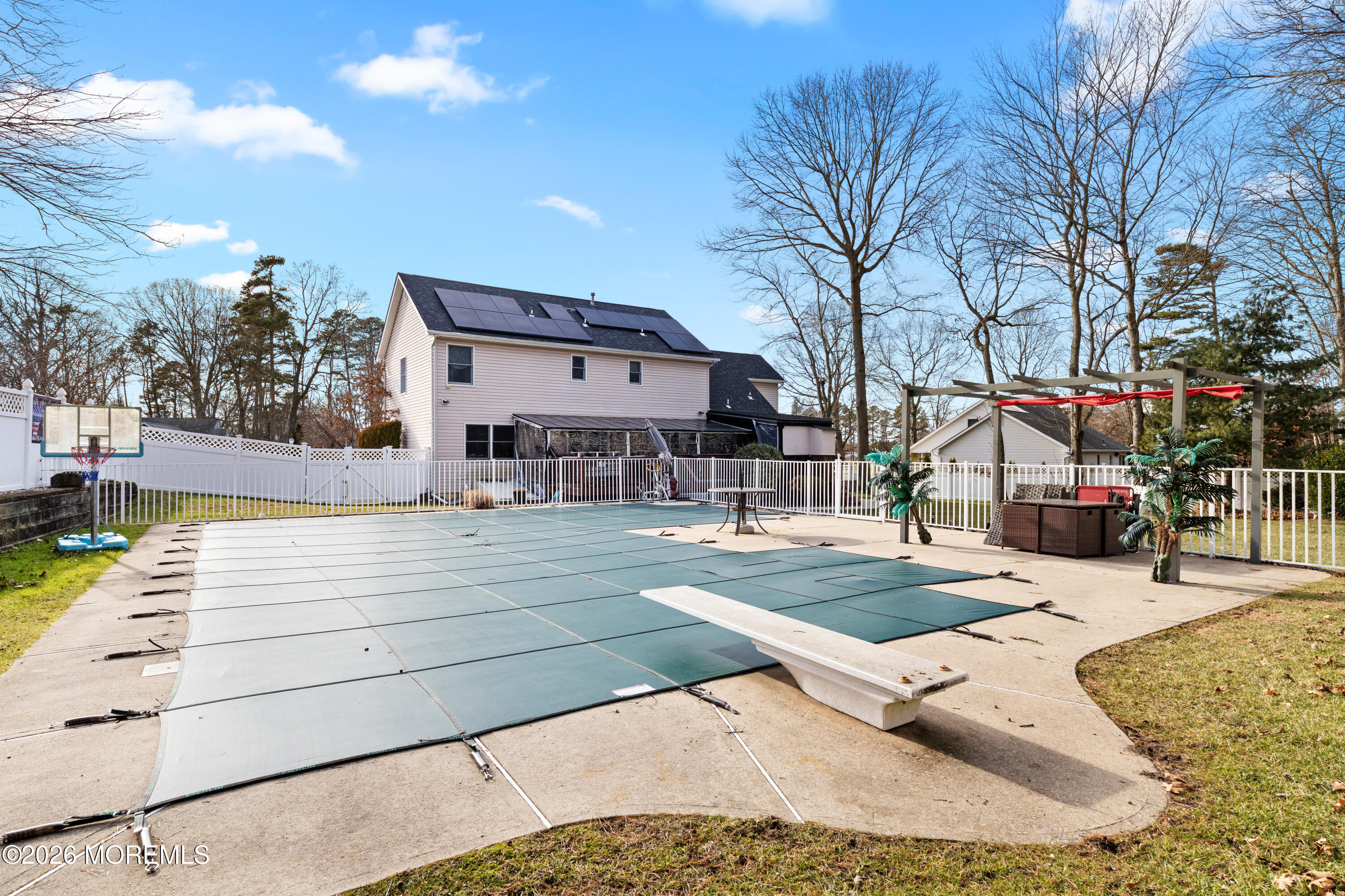 746 Rabbit Run Brick, NJ 08724 - Photo 5 of 41 a view of a building with snow on the road