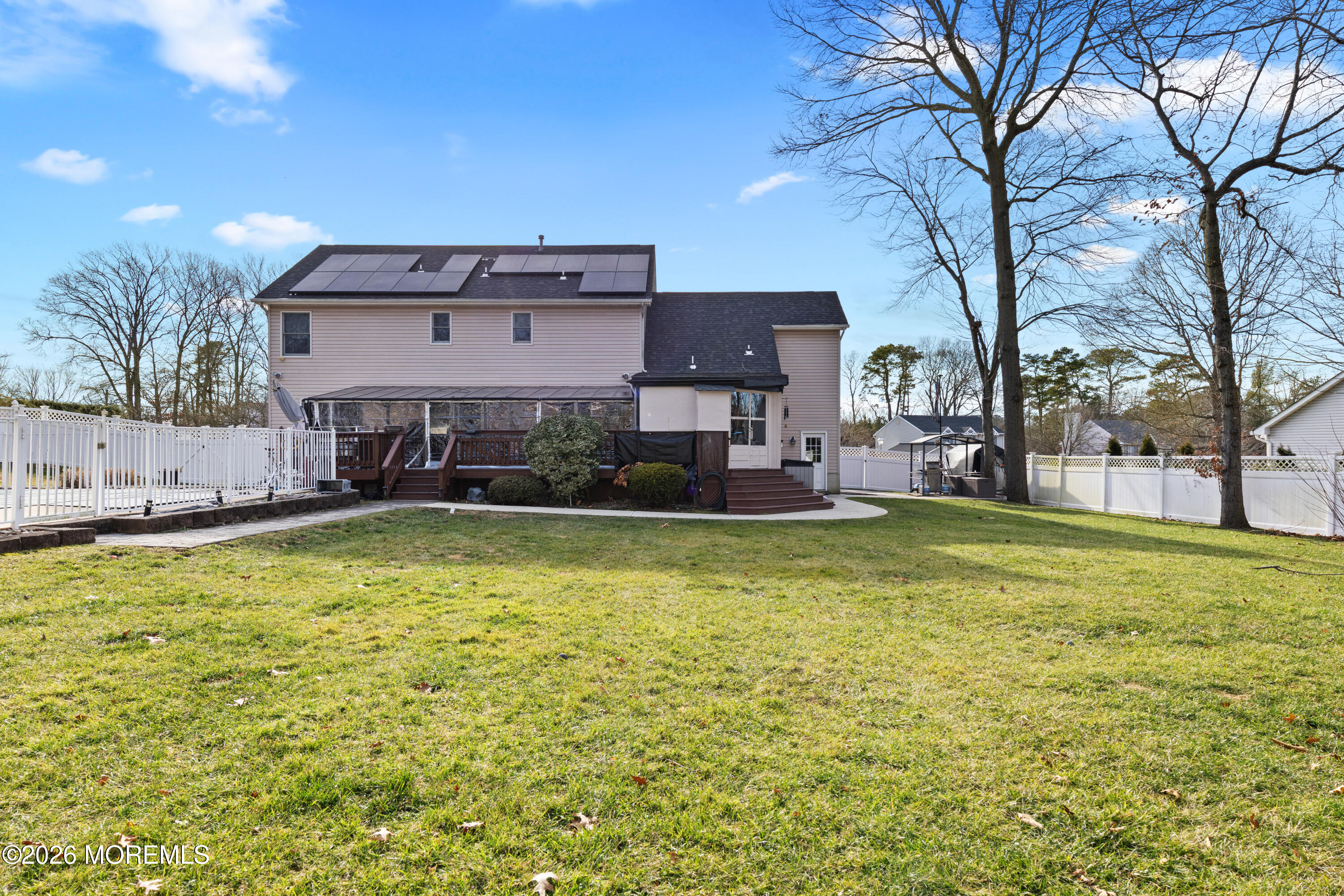 746 Rabbit Run Brick, NJ 08724 - Photo 6 of 41 a swimming pool is sitting in the middle of a house