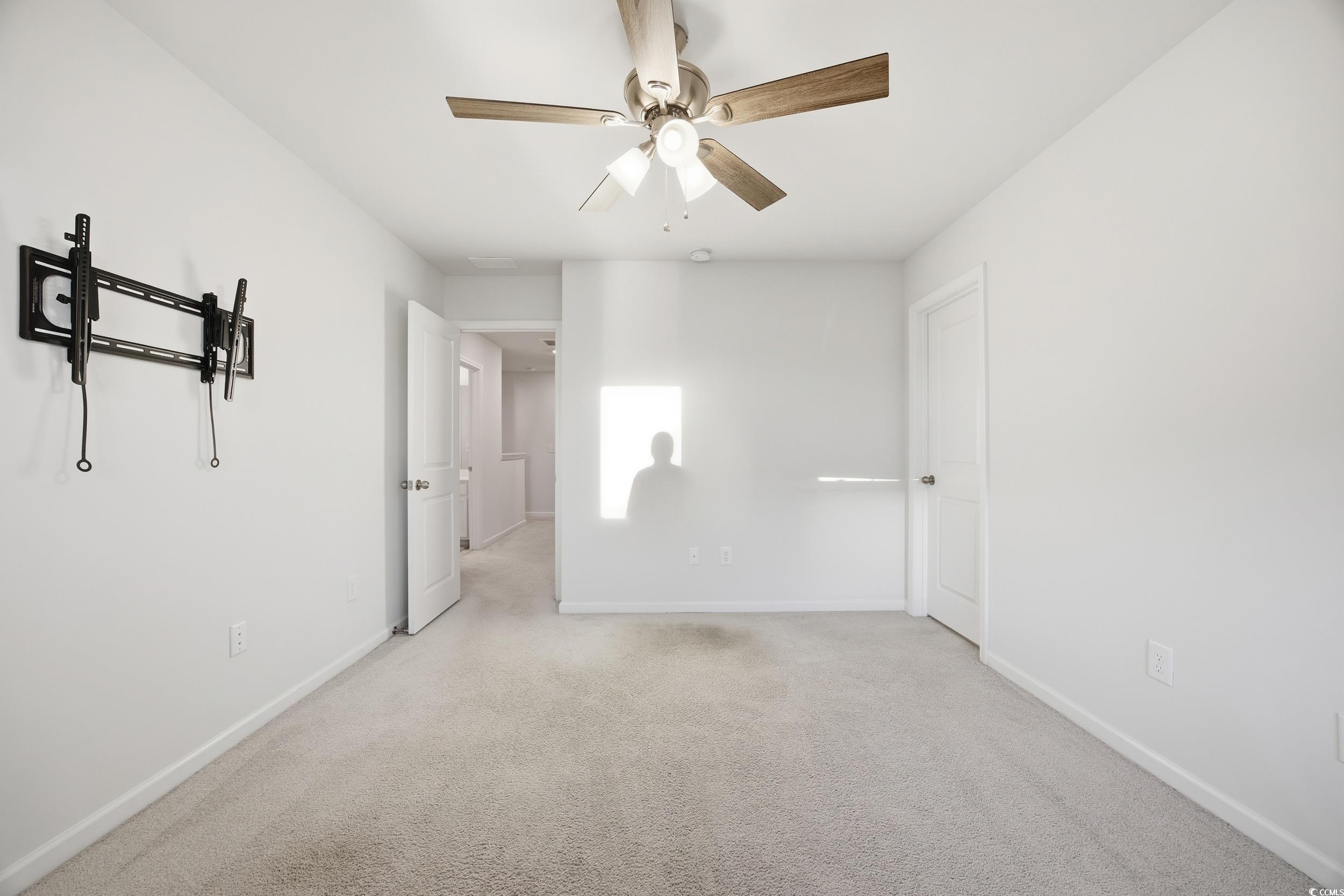 386 Harbison Circle Myrtle Beach, SC 29579 - Photo 30 of 34 Unfurnished bedroom featuring carpet flooring and a ceiling fan