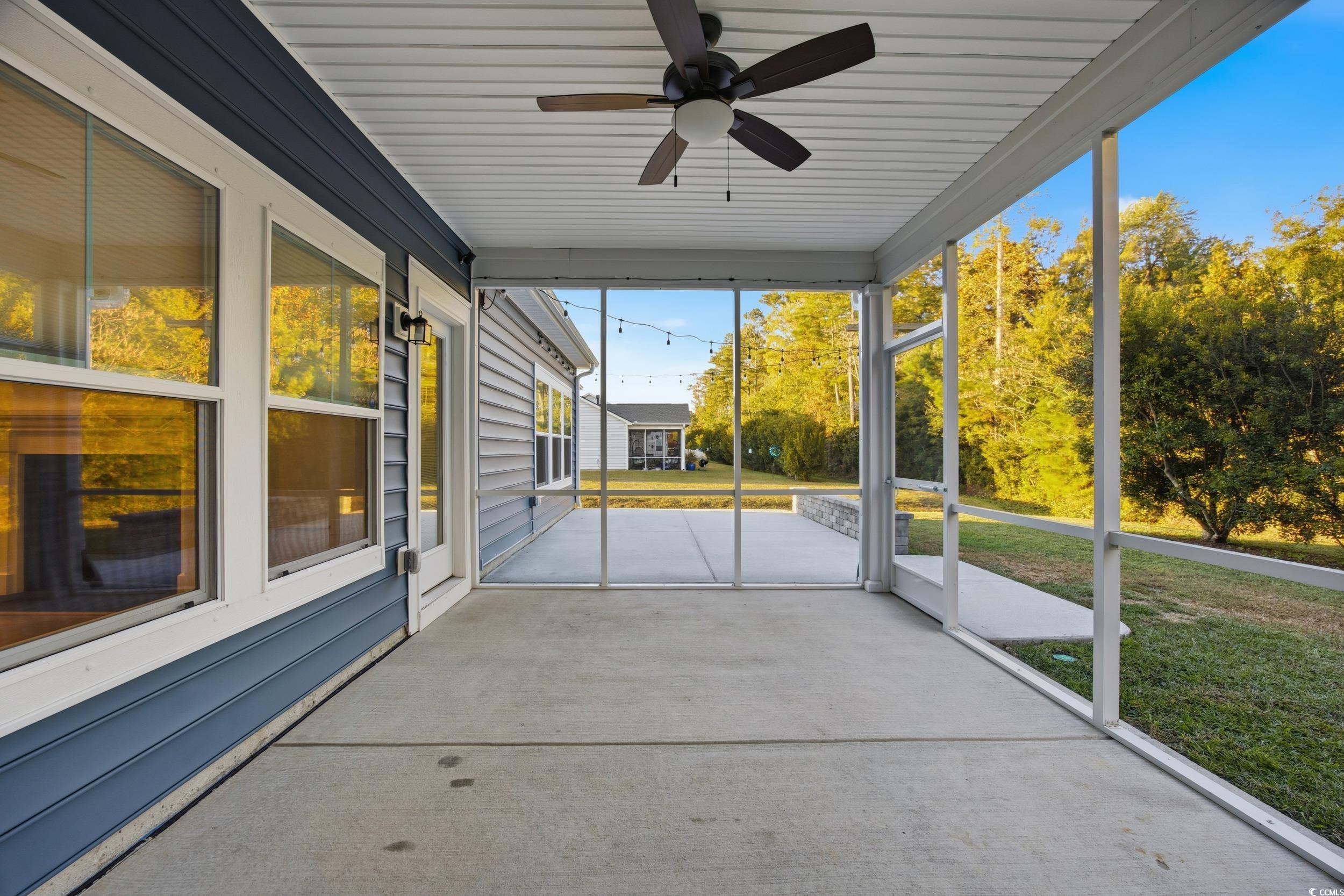 386 Harbison Circle Myrtle Beach, SC 29579 - Photo 33 of 40 Unfurnished sunroom with a ceiling fan