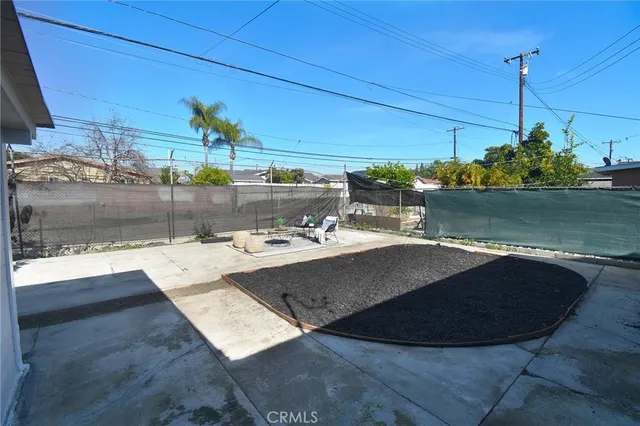 a view of a swimming pool with a outdoor seating
