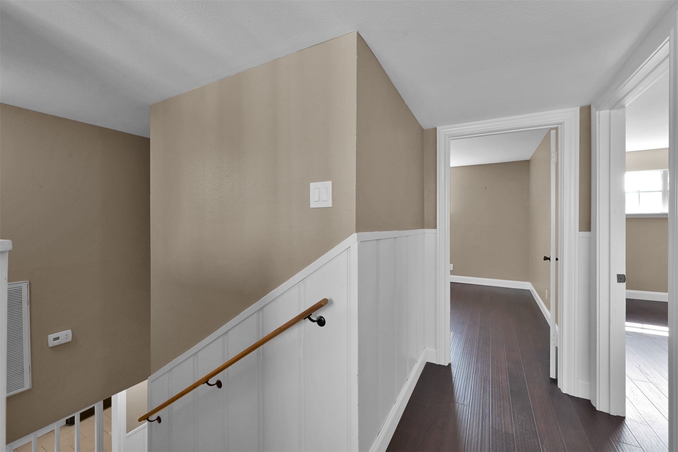 416 Milwaukee Street Houston, TX 77009 - Photo 13 of 25 a view of an empty room with wooden floor