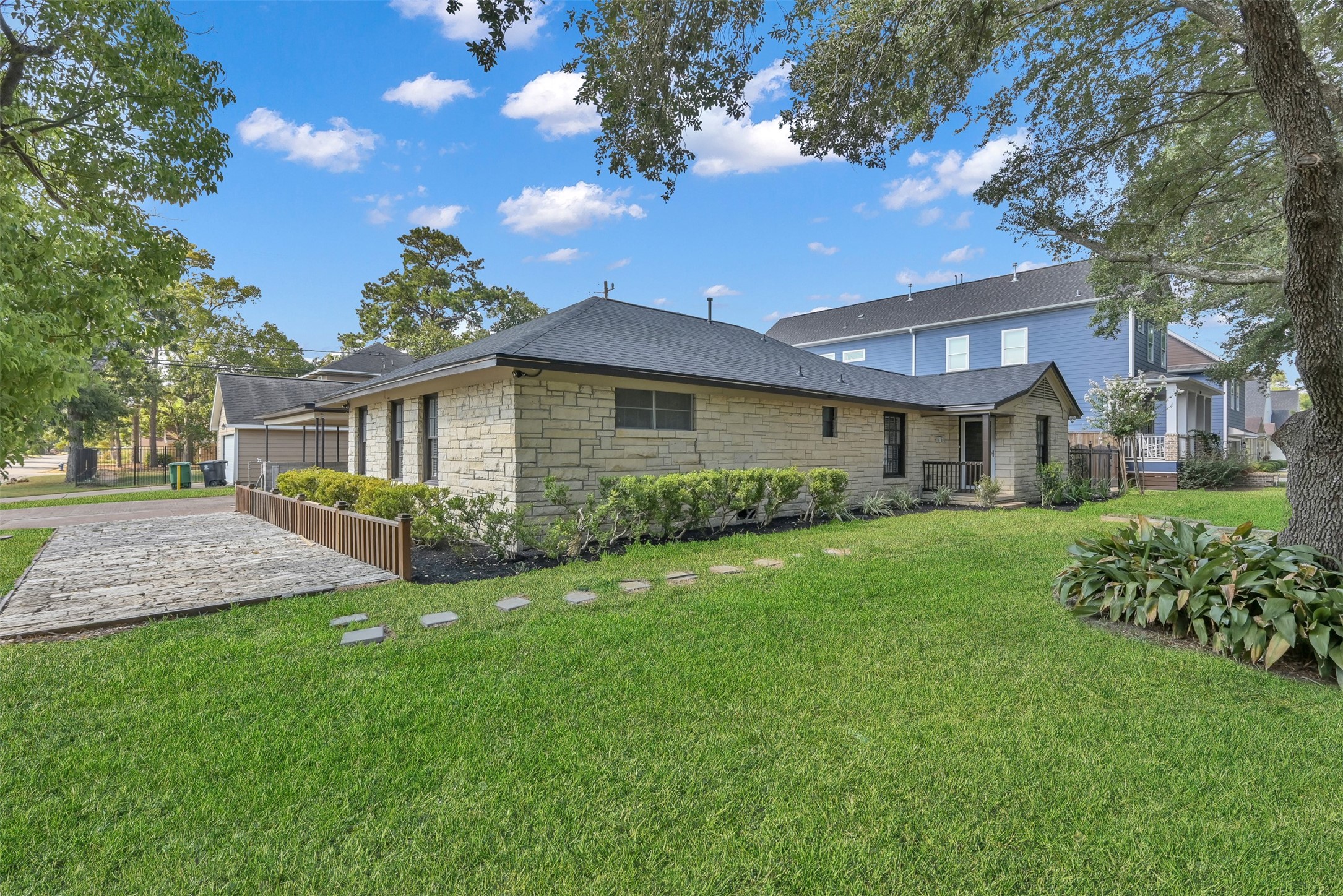 416 Milwaukee Street Houston, TX 77009 - Photo 24 of 25 a front view of a house with a garden