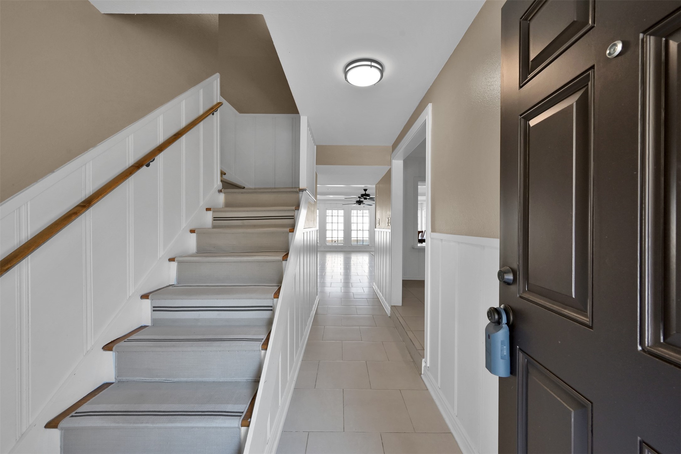 416 Milwaukee Street Houston, TX 77009 - Photo 5 of 25 a view of entryway with wooden floor and stairs