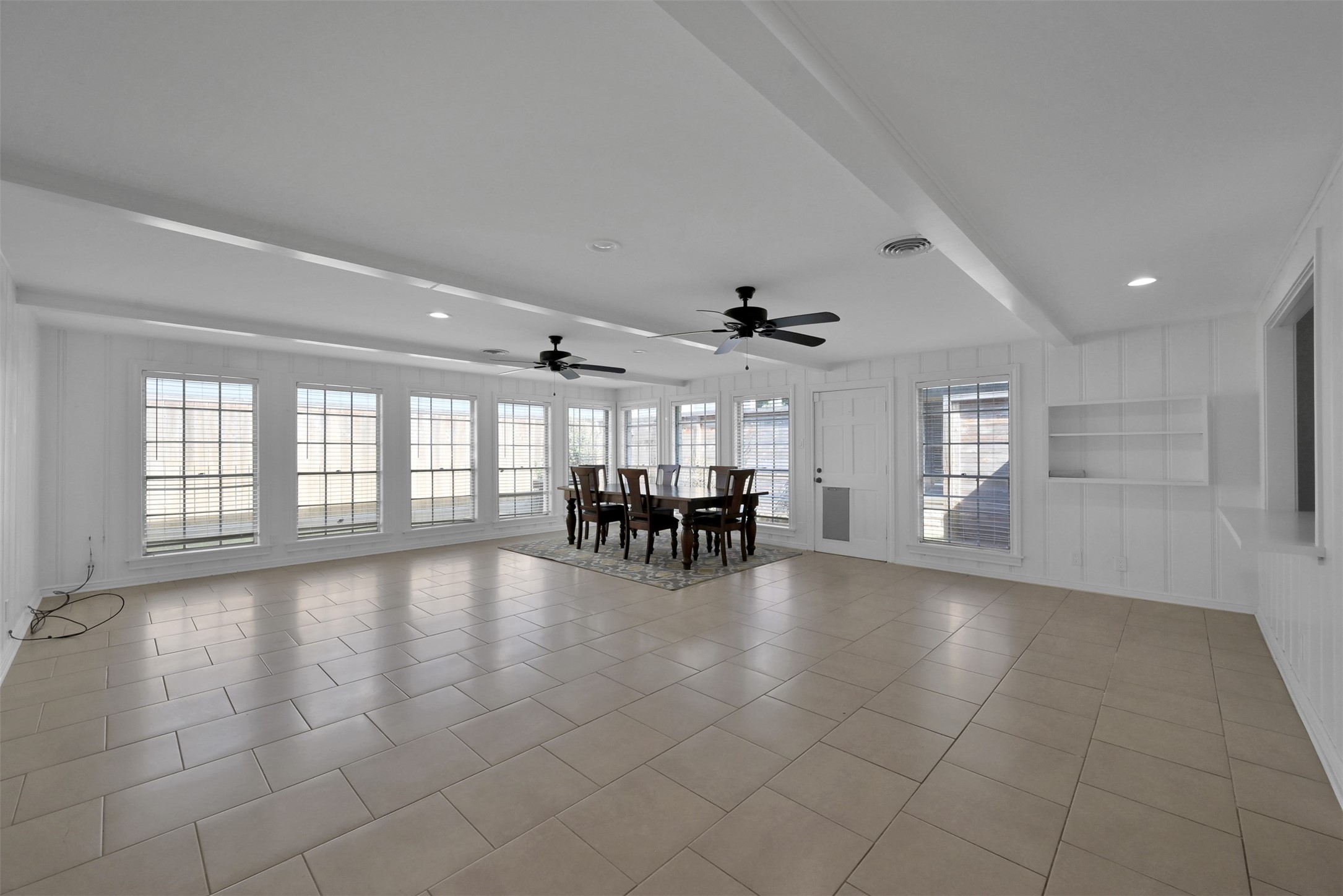 416 Milwaukee Street Houston, TX 77009 - Photo 6 of 25 a view of an empty room with a window