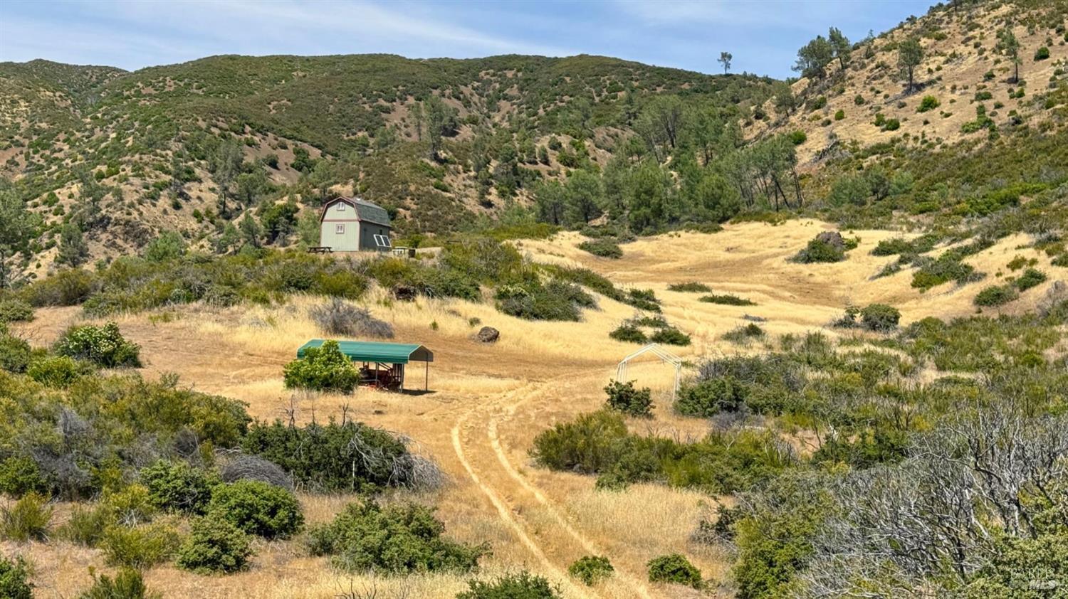 5250 15 N 05 Road Clearlake Oaks, CA 95423 - Photo 32 of 85 a view of a lake with mountains in the background