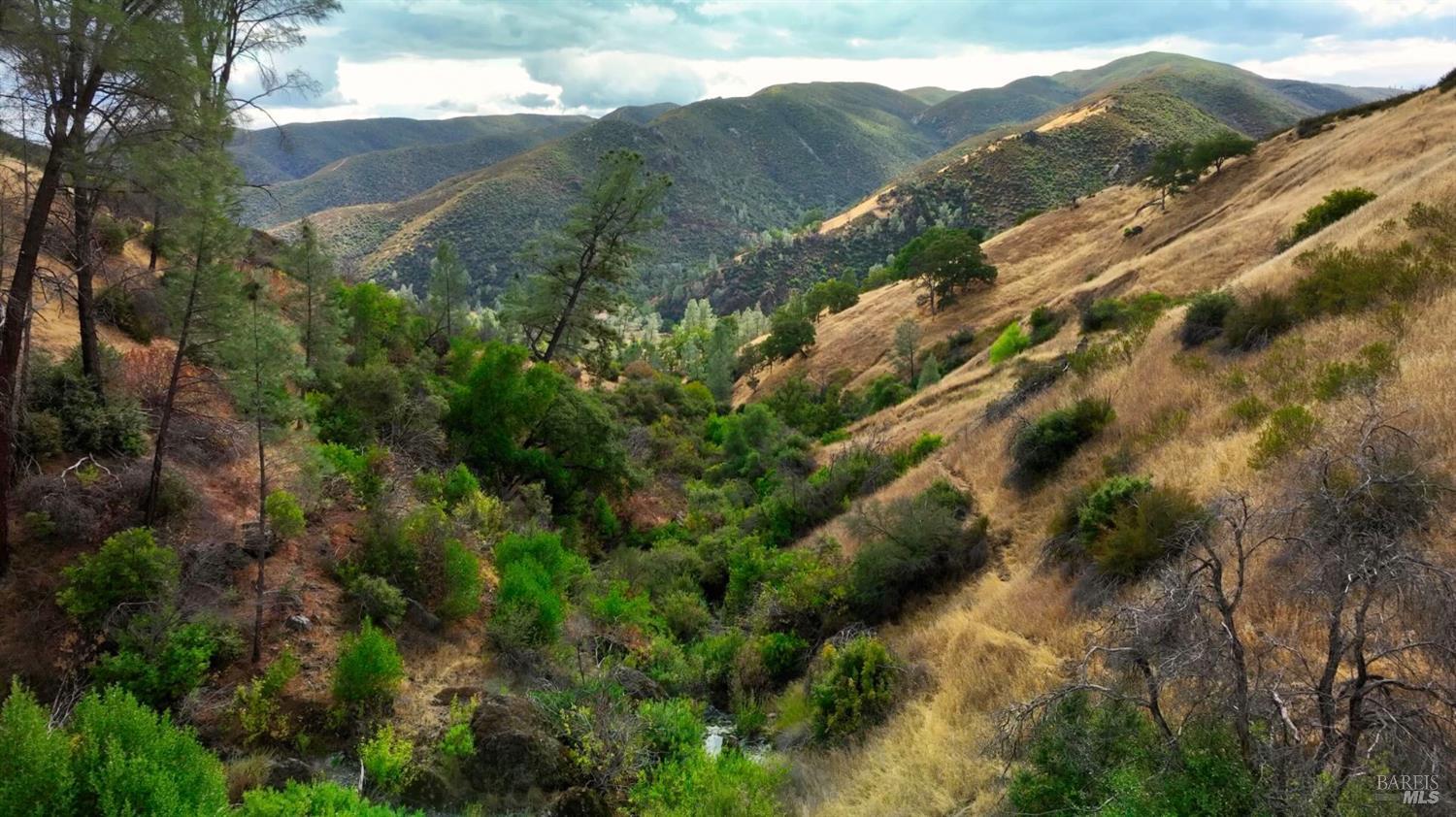 5250 15 N 05 Road Clearlake Oaks, CA 95423 - Photo 46 of 85 a view of a houses with a lush green hillside