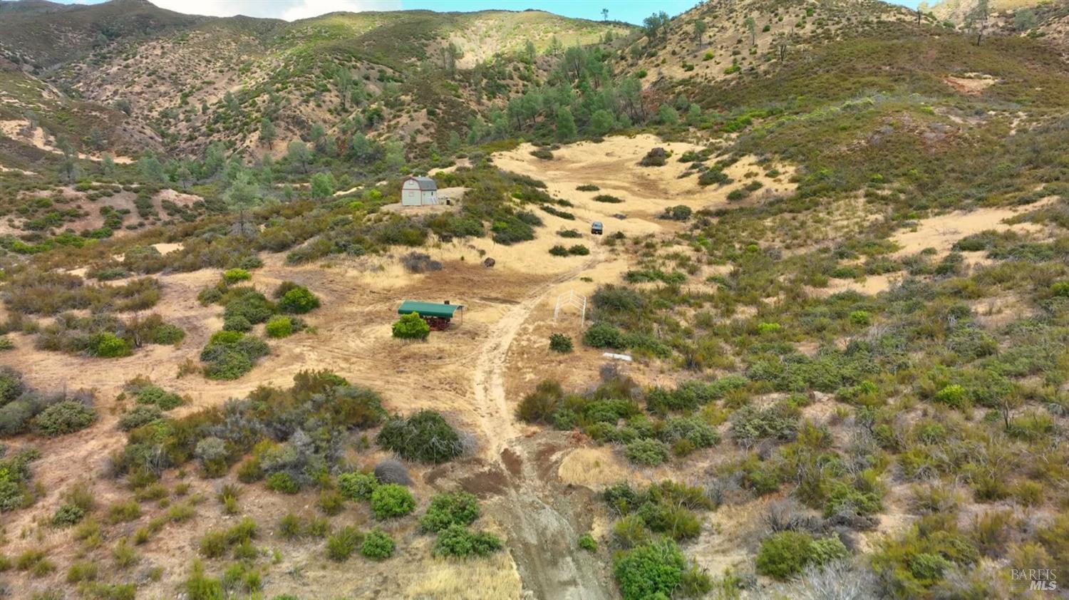 5250 15 N 05 Road Clearlake Oaks, CA 95423 - Photo 51 of 85 a view of a field with mountains in the background