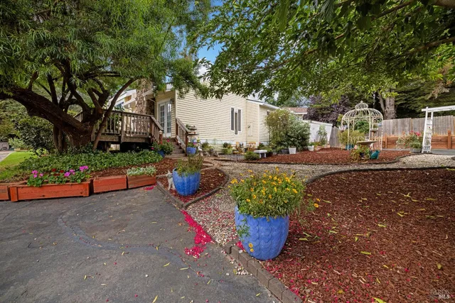an aerial view of a house having swimming pool patio and outdoor seating