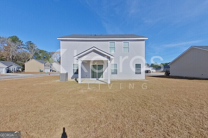 101 St Matthew Way Springfield, GA 31329 - Photo 26 of 30 front view of a house with a street