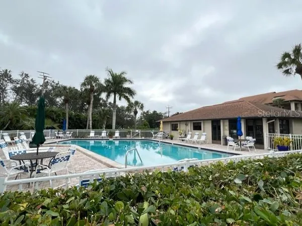 a view of house with outdoor space patio and outdoor seating