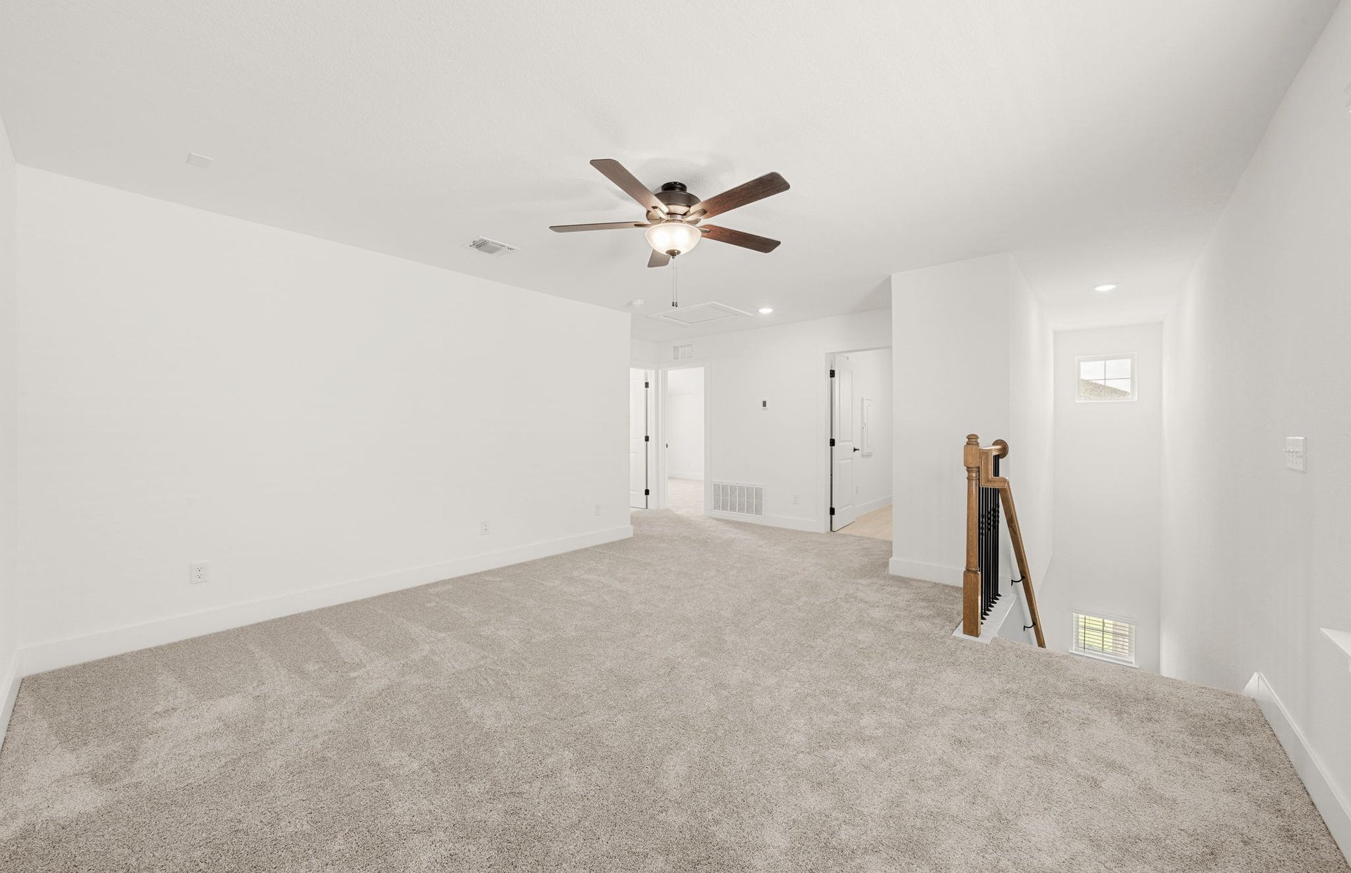 560 Tailwind Drive Kyle, TX 78640 - Photo 17 of 37 an empty room with closet and a ceiling fan