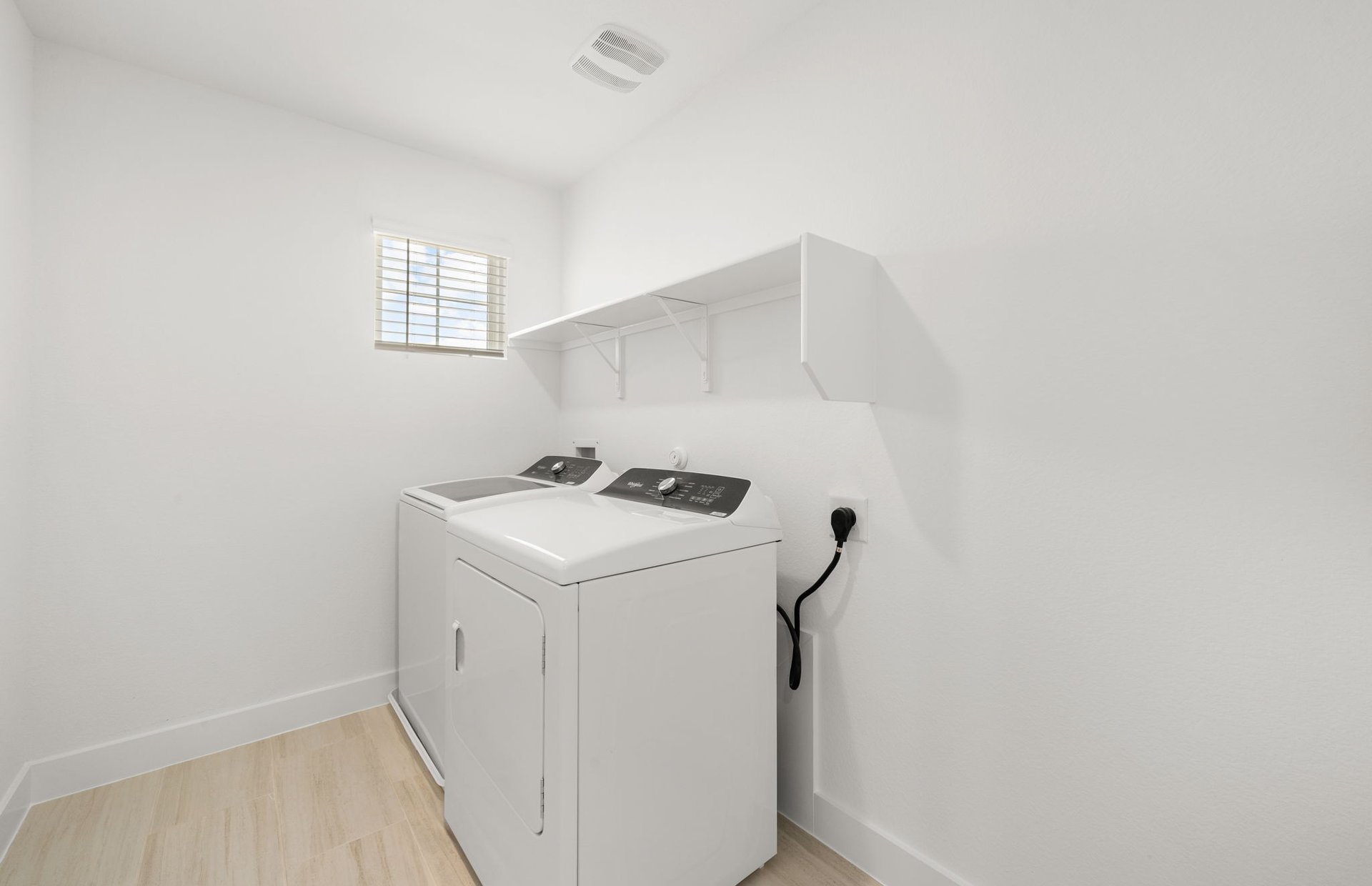 560 Tailwind Drive Kyle, TX 78640 - Photo 19 of 37 a utility room with dryer and washer