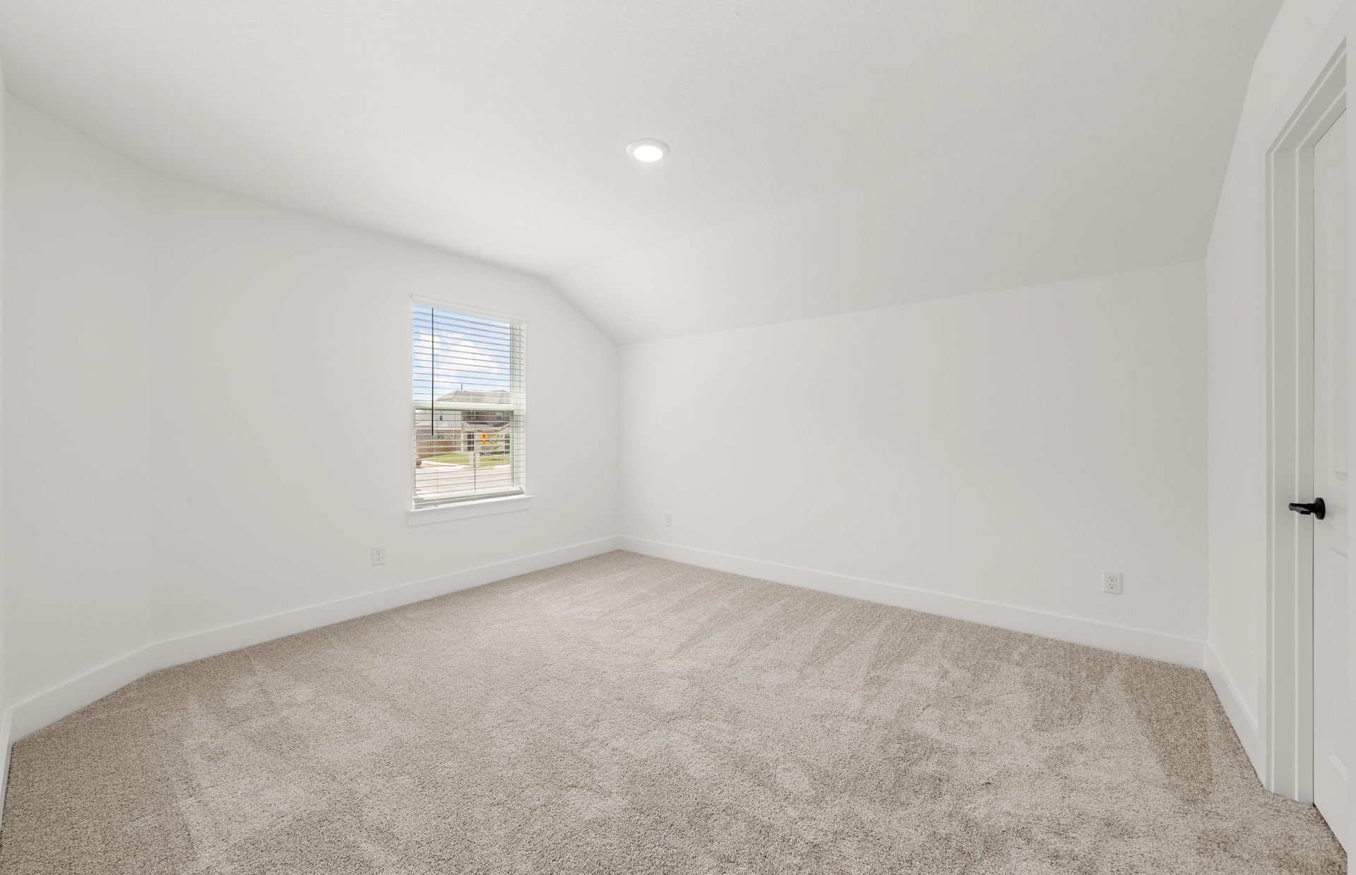 560 Tailwind Drive Kyle, TX 78640 - Photo 21 of 37 an empty room with a window