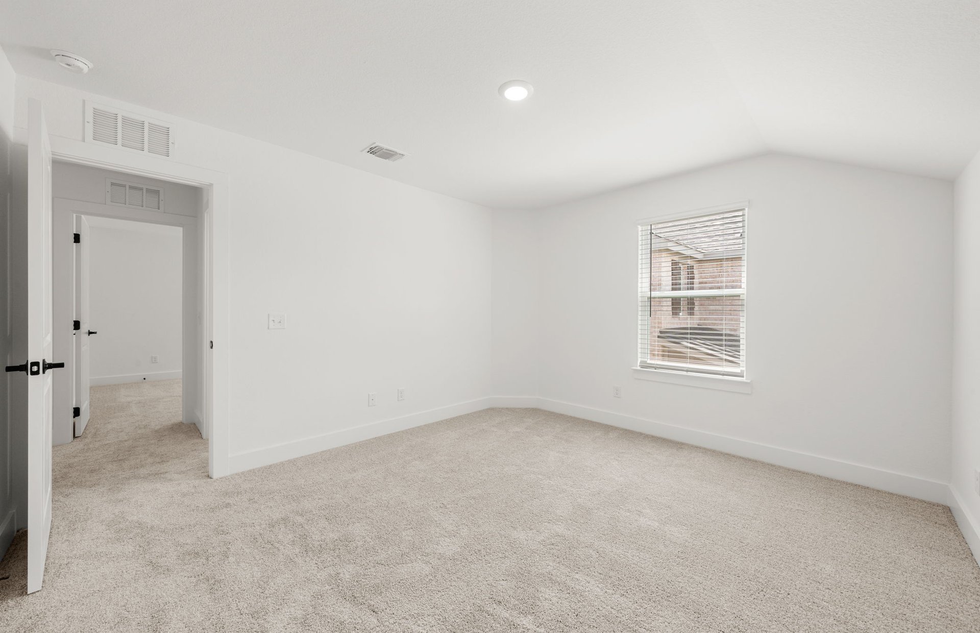 560 Tailwind Drive Kyle, TX 78640 - Photo 22 of 37 an empty room with a window
