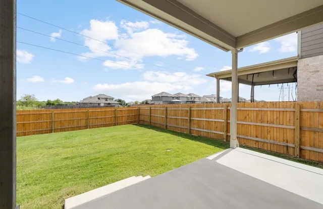 a bathroom with a tub and shower