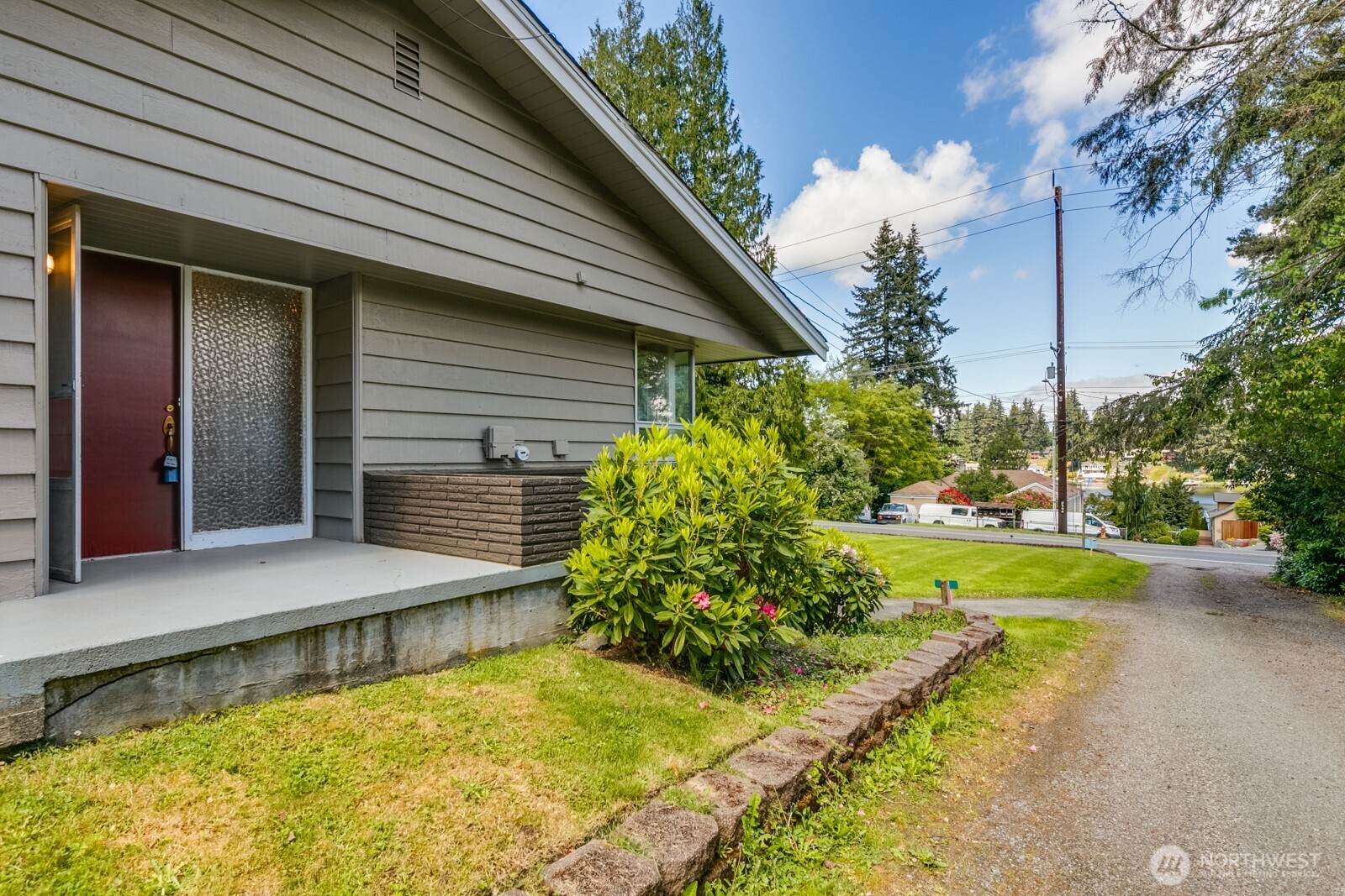 3822 Shelby Road Lynnwood, WA 98087 - Photo 2 of 40 a view of a house with backyard and sitting area