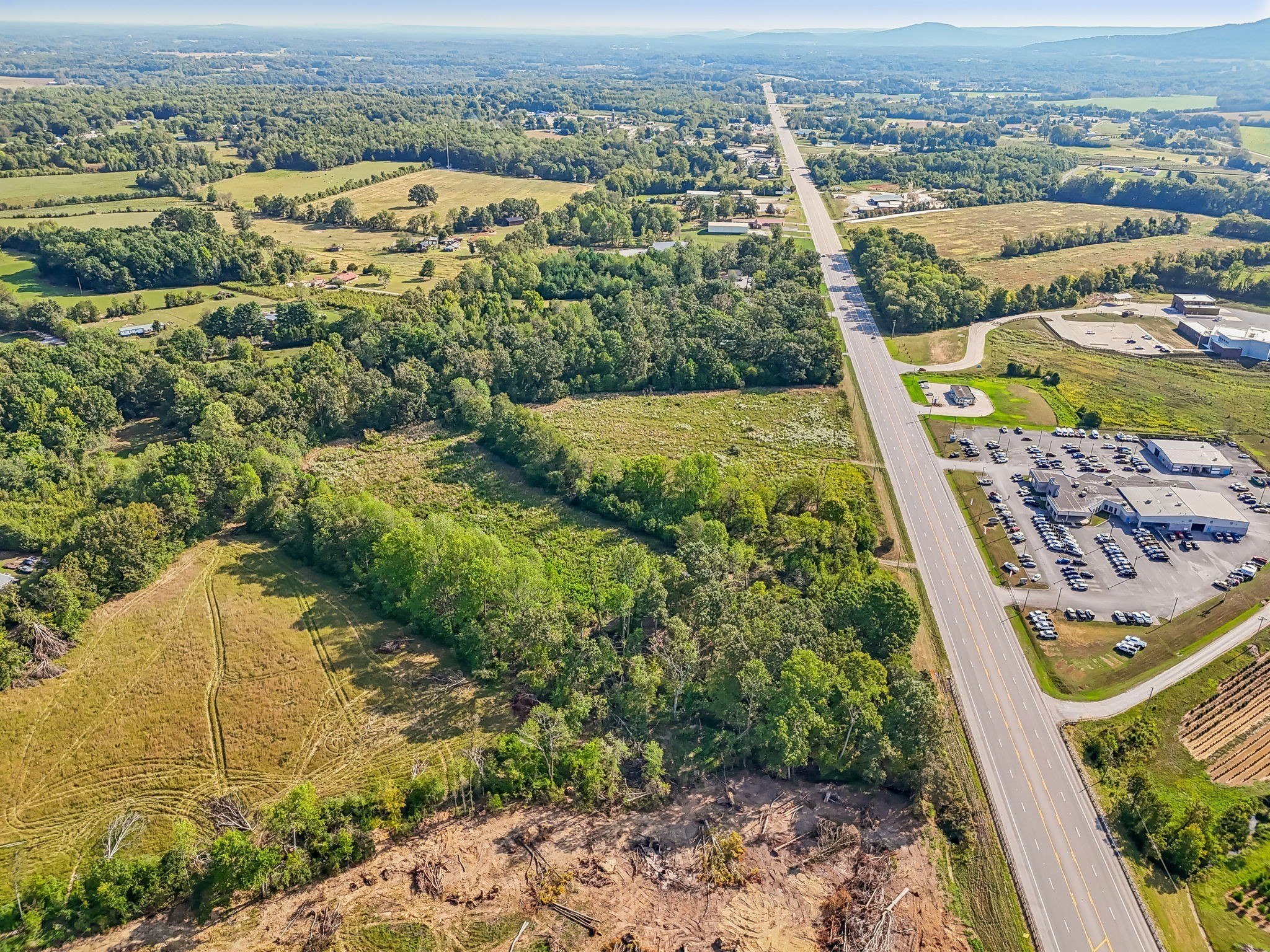 5944 Manchester Highway Morrison, TN 37357 - Photo 4 of 14 an aerial view of residential houses with outdoor space