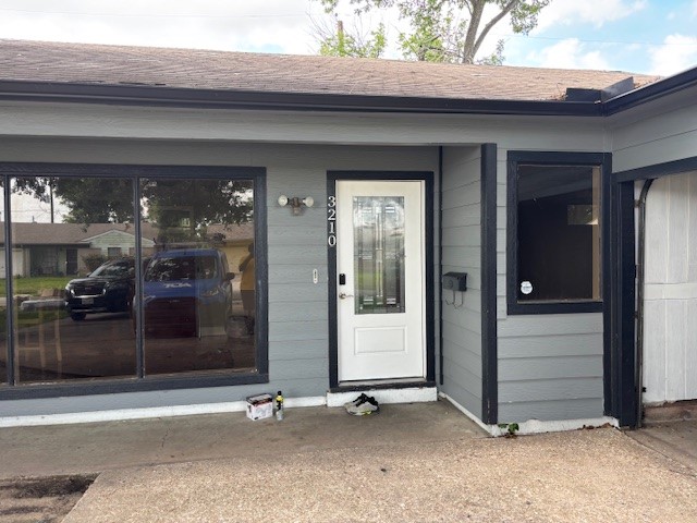 an outdoor view of shop with window
