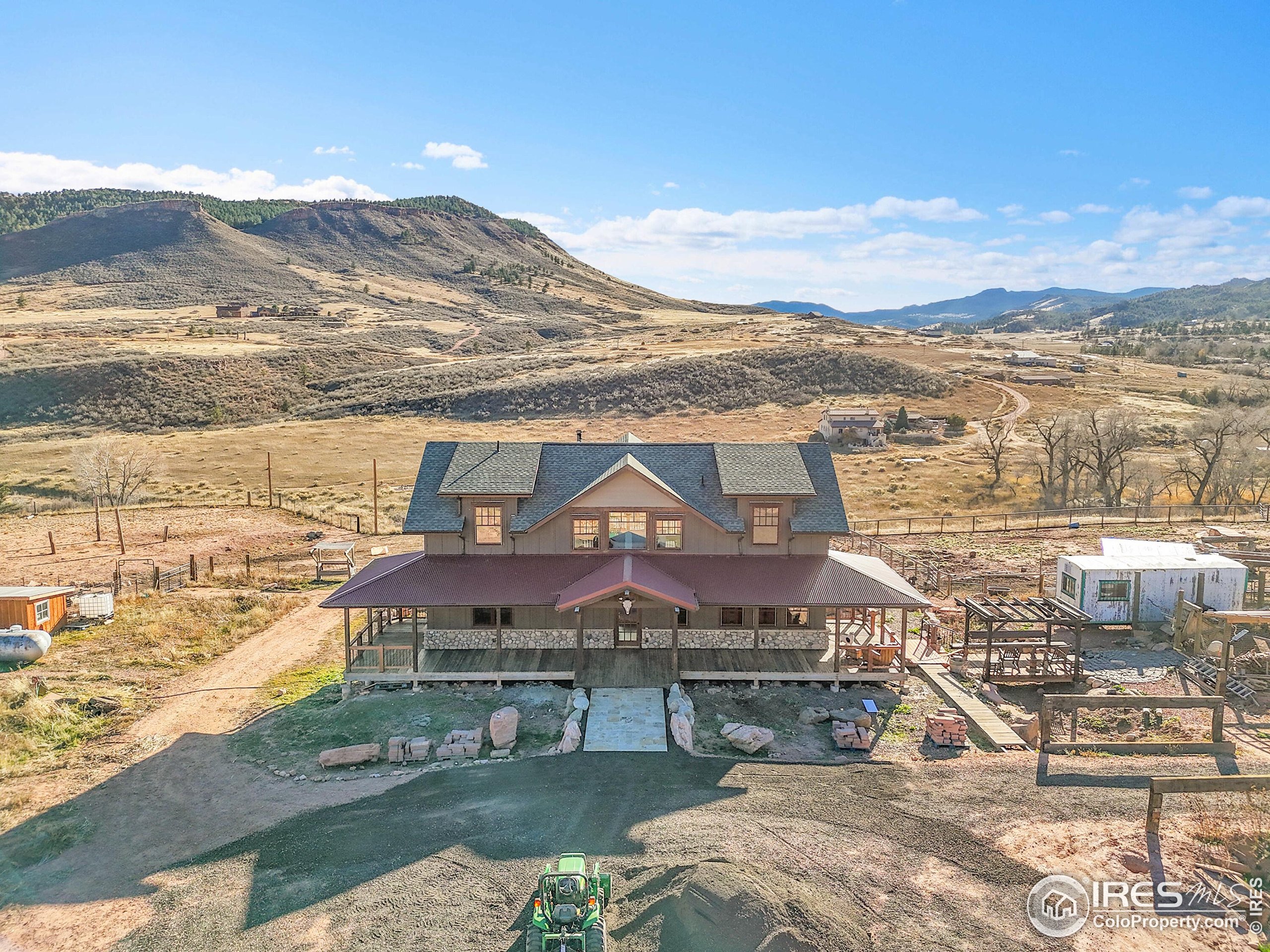 702 Ponderosa Hill Road Lyons, CO 80540 - Photo 31 of 39 a view of a city with an ocean view
