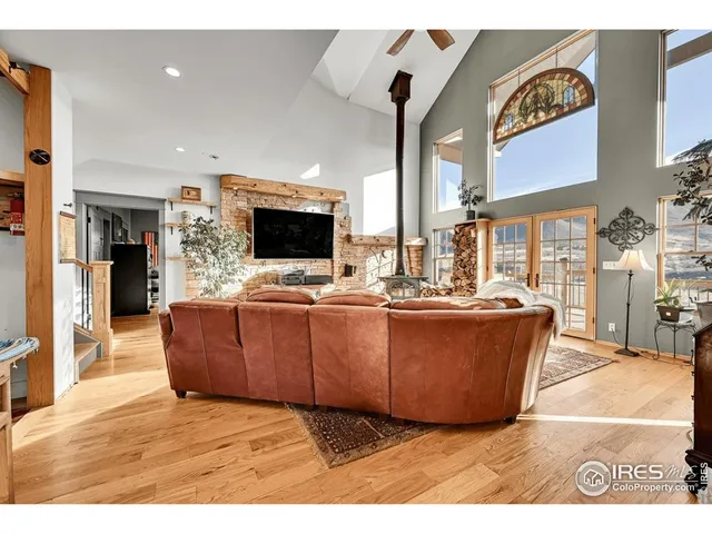 a kitchen with cabinets appliances a sink and a window