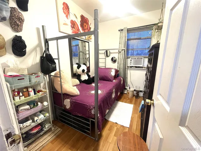 a bathroom with a double vanity sink toilet mirror and tub