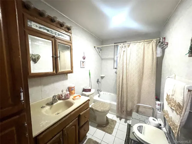 a view of a hallway with stairs