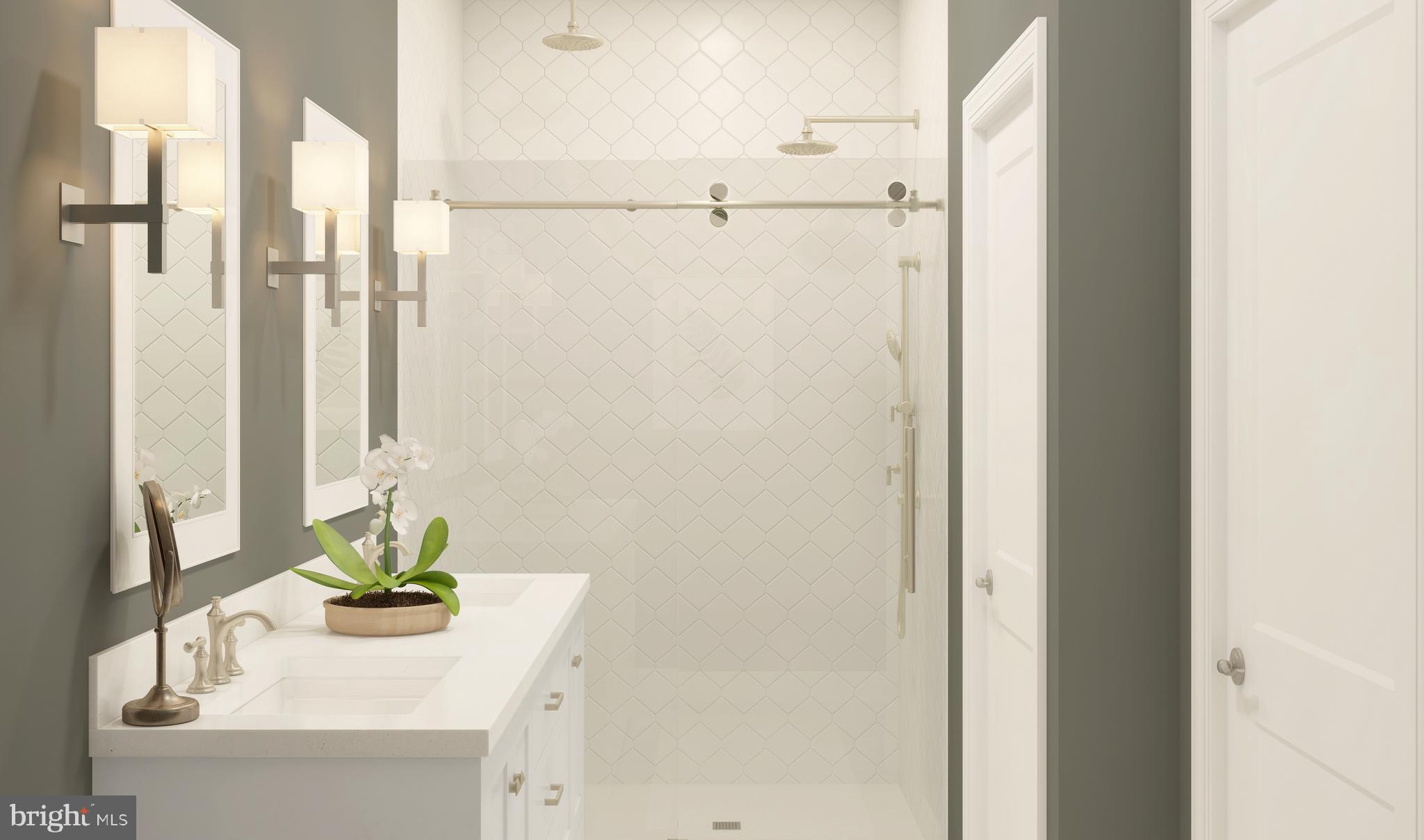 1402 Justin Drive, Unit 1403 West Windsor, NJ 08550 - Photo 12 of 15 a bathroom with a sink and a mirror