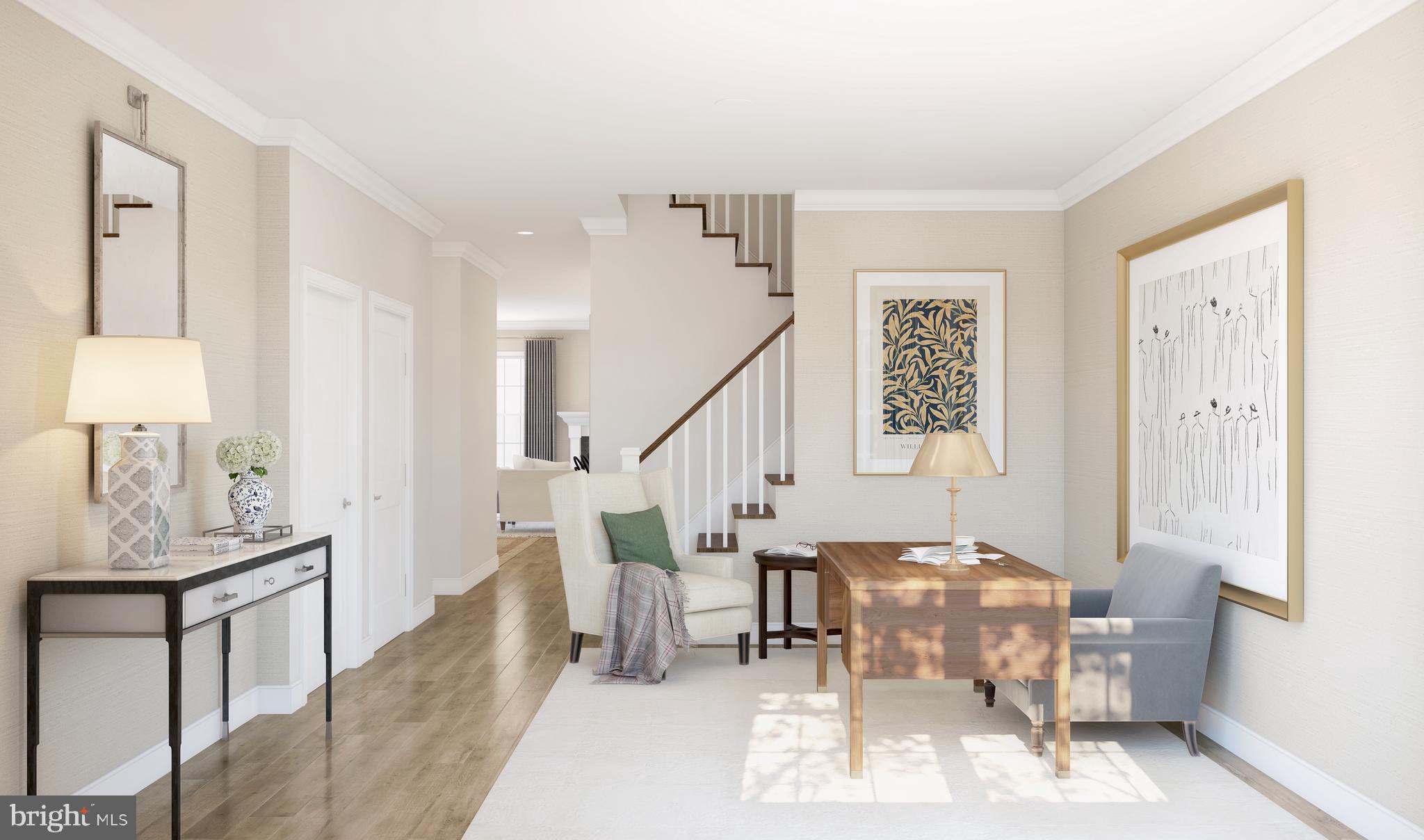 1402 Justin Drive, Unit 1403 West Windsor, NJ 08550 - Photo 10 of 15 a living room with furniture and wooden floor