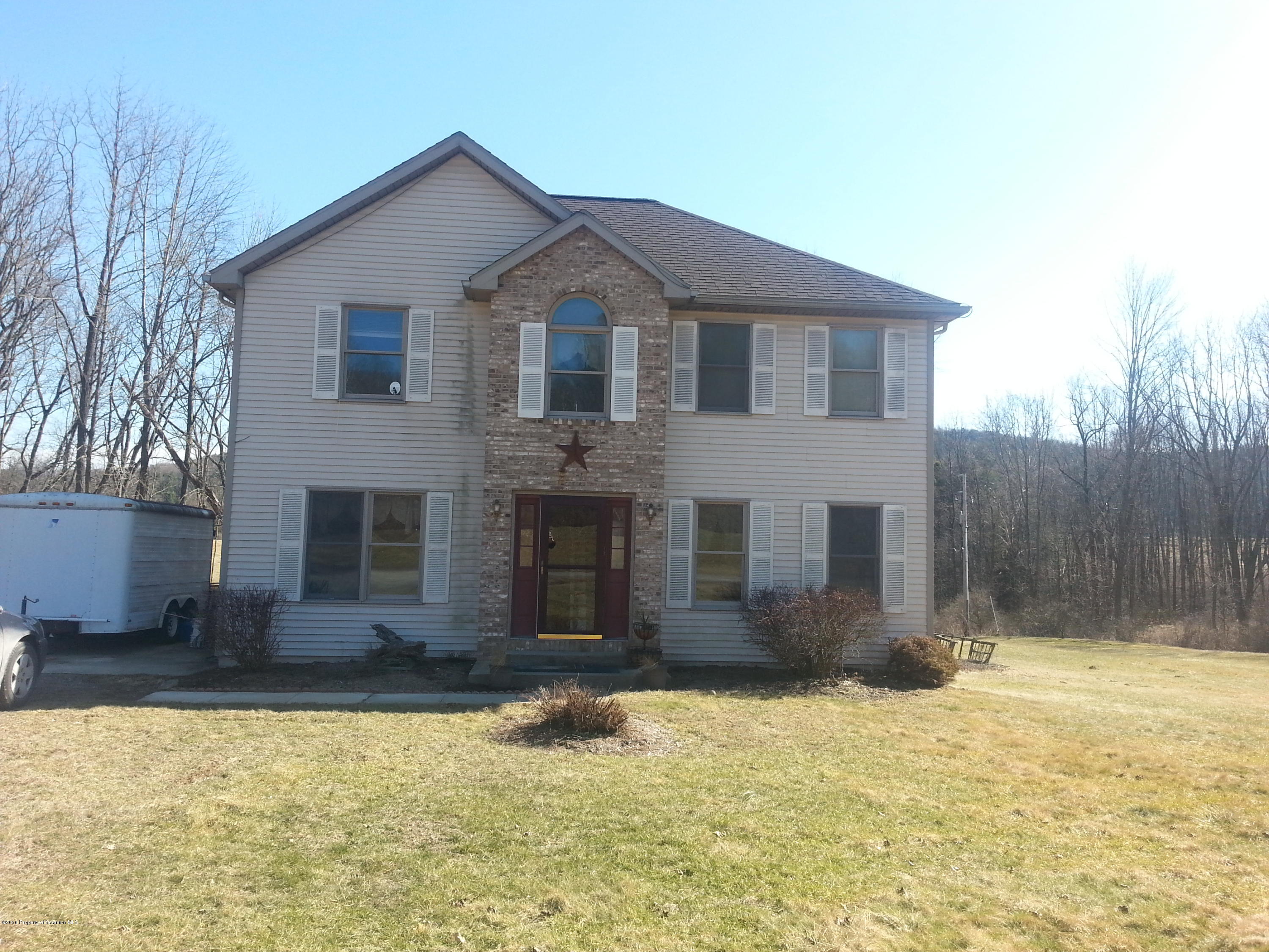 9021 State Rte 6 Meshoppen, PA 18630 - Photo 1 of 16 a front view of a house with a yard