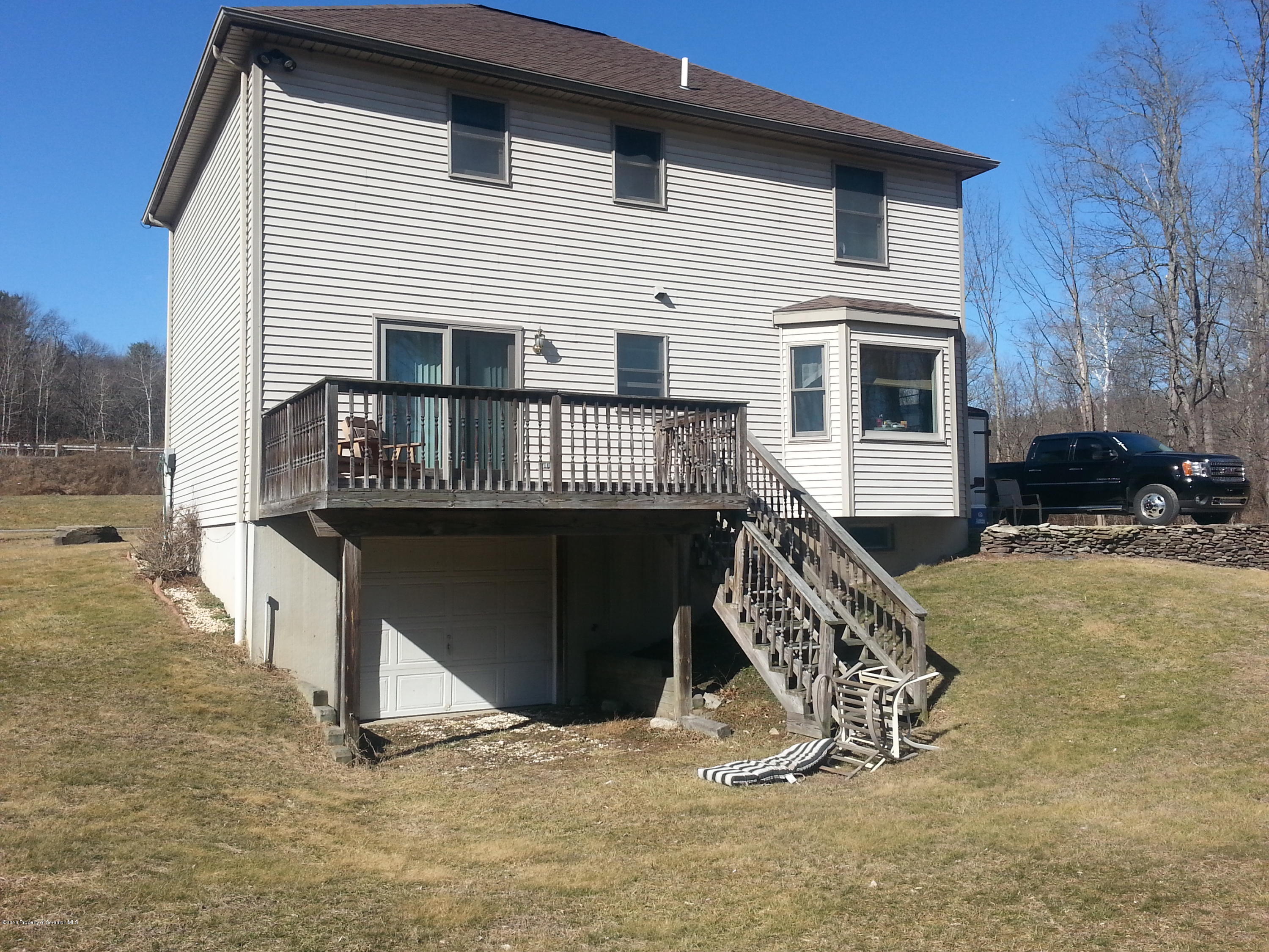 9021 State Rte 6 Meshoppen, PA 18630 - Photo 11 of 16 a view of a house with a balcony