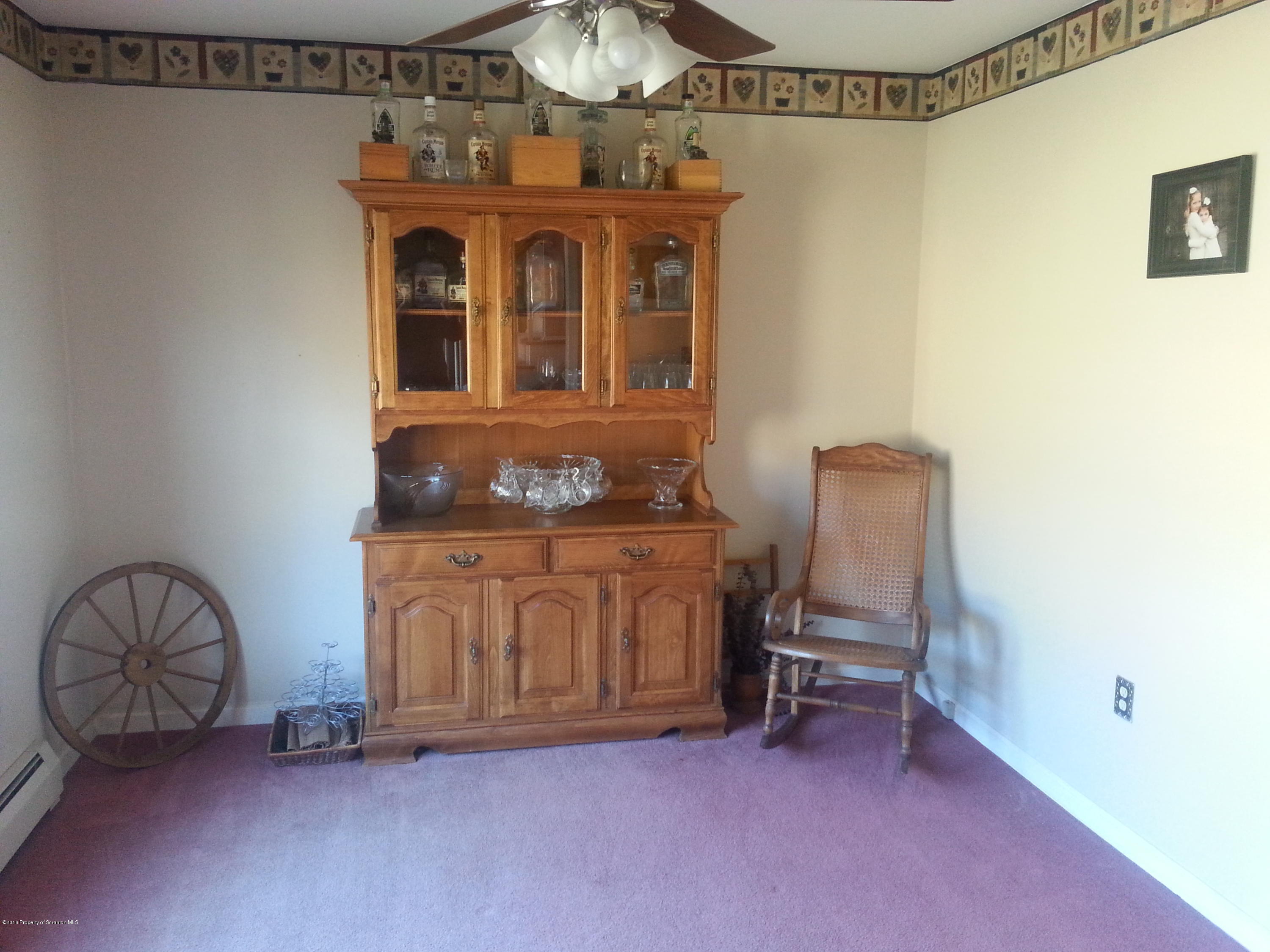 9021 State Rte 6 Meshoppen, PA 18630 - Photo 4 of 16 a view of livingroom with furniture and chandelier