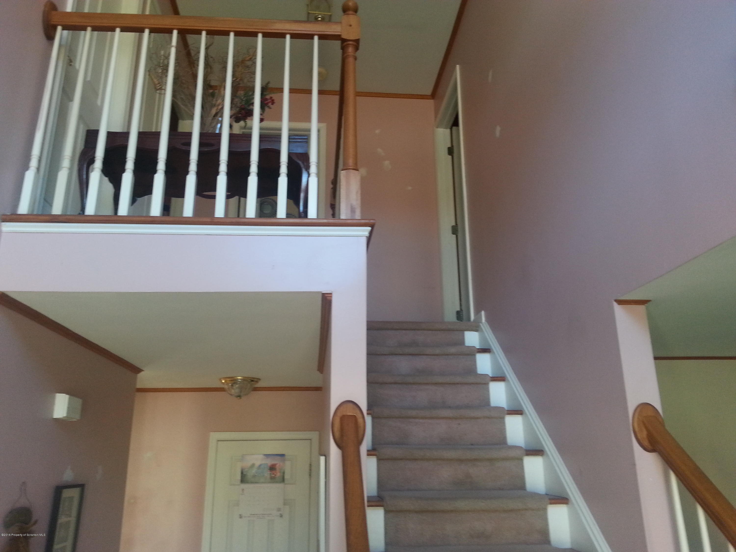 9021 State Rte 6 Meshoppen, PA 18630 - Photo 6 of 16 a view of staircase with railing and a window