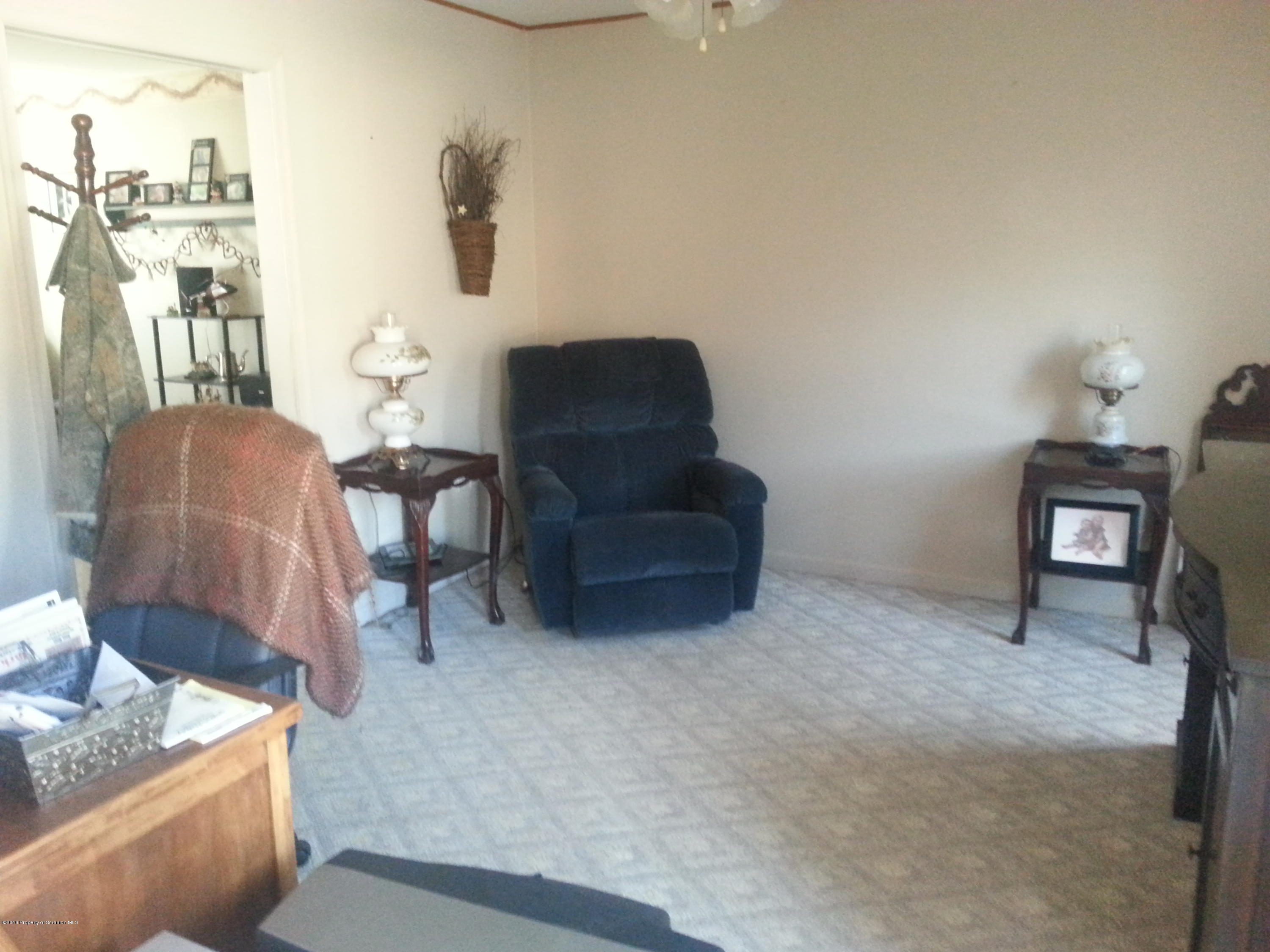 9021 State Rte 6 Meshoppen, PA 18630 - Photo 7 of 16 a living room with furniture and a couch