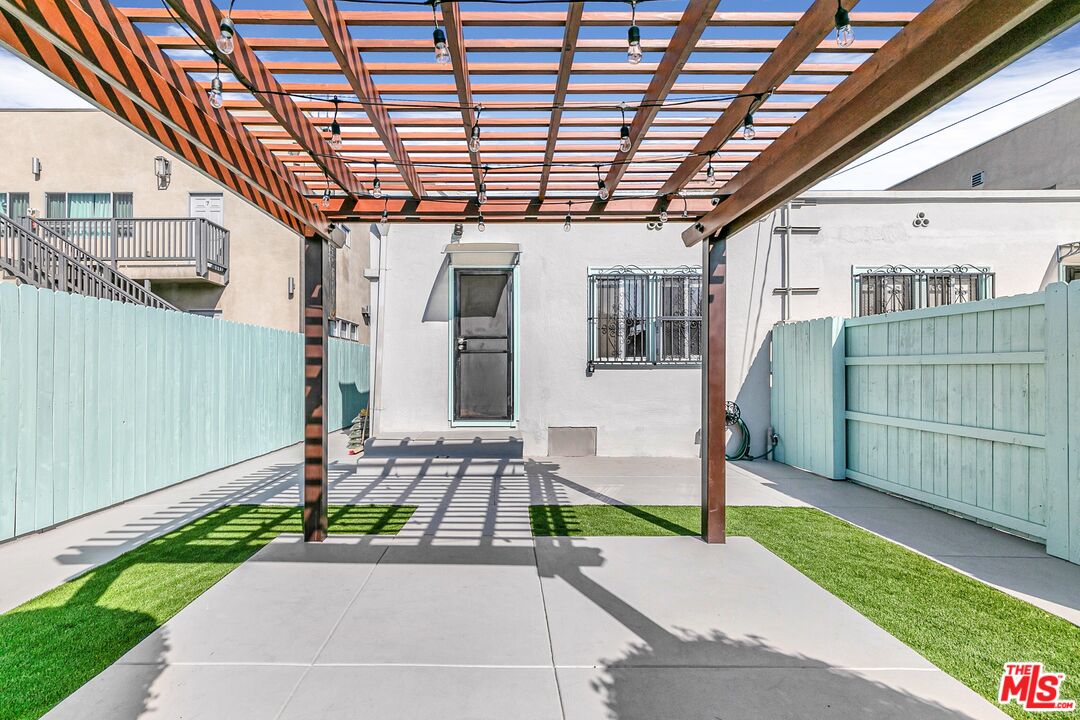 123 North Reno Street Los Angeles, CA 90026 - Photo 24 of 28 a front view of a house with garden