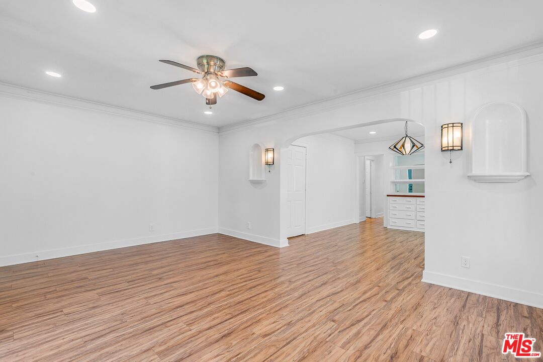 123 North Reno Street Los Angeles, CA 90026 - Photo 5 of 28 a view of empty room with wooden floor