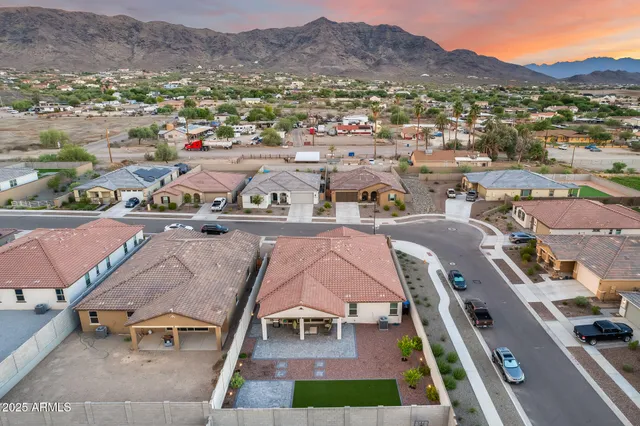 an aerial view of a house with a garden