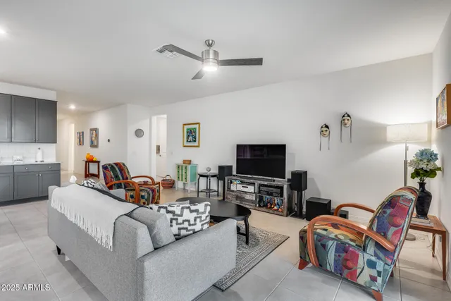 a view of a dining room with furniture and a window