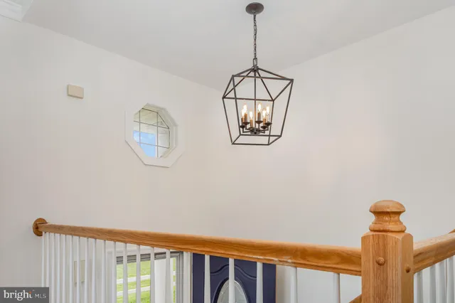 a view of a hallway with windows