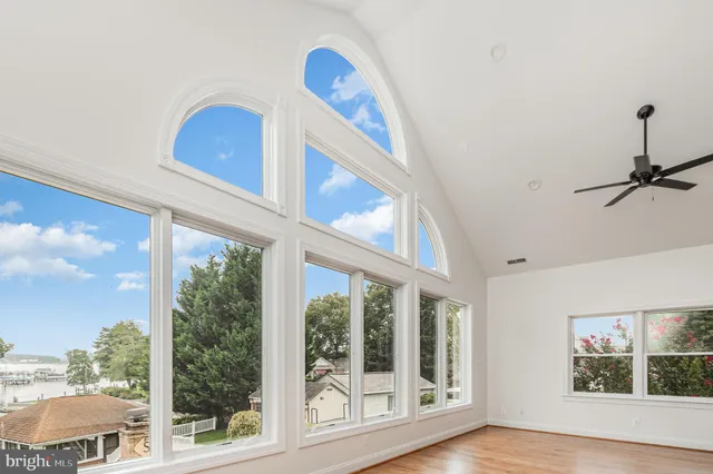 a view of an entryway with wooden floor