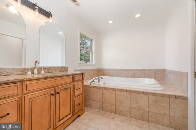 a bathroom with a sink and a bathtub
