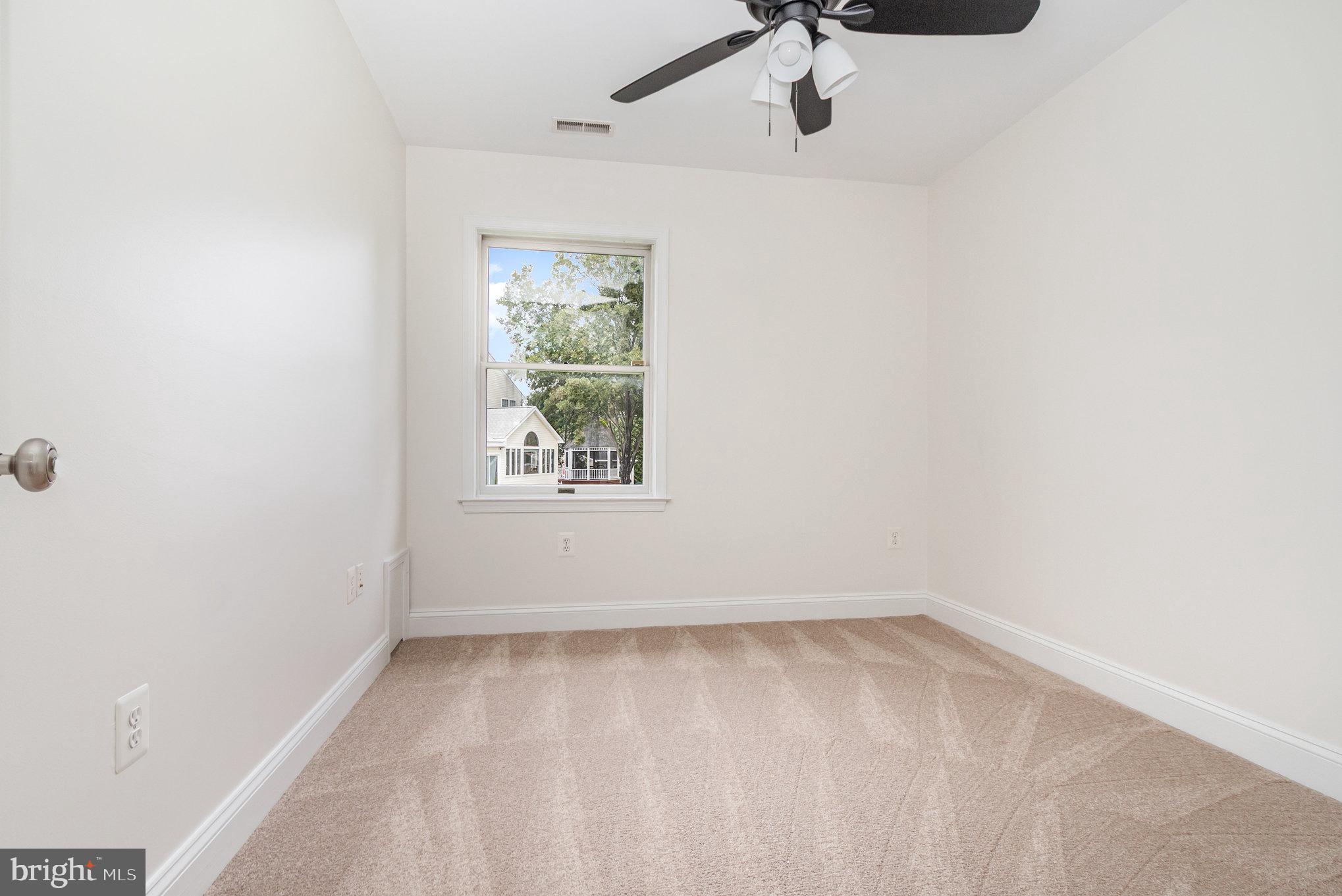 70 Johnson Road Pasadena, MD 21122 - Photo 21 of 35 an empty room with a window